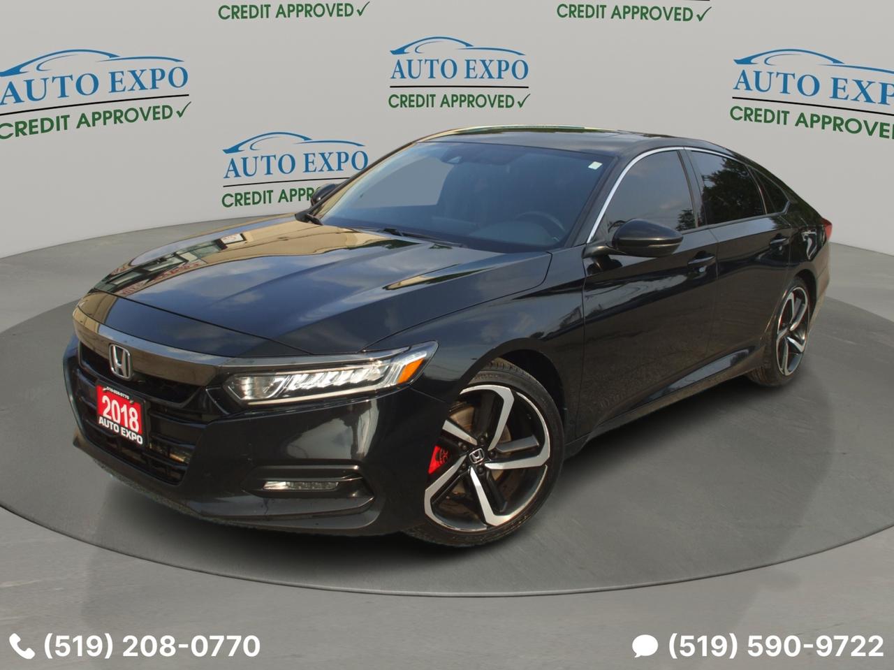 <p>SOLD,,,SOLD,,,SOLD</p><p>Looking for a sleek and sporty sedan that makes a statement? Check out this stunning 2018 Honda Accord Sport, available now at Auto Expo Inc.! This head-turning black-on-black beauty is more than just a car; its an experience. With its bold exterior and refined interior, this Accord Sport offers a perfect blend of style and functionality. This Certified pre-owned vehicle has been meticulously inspected to ensure your peace of mind. Plus, with just 165,000km on the odometer, this Accord is ready to provide you with years of reliable and enjoyable driving.</p><p>Here are some of the features that make this 2018 Honda Accord Sport a must-see:</p><ul><li><strong>Sporty Sophistication:</strong> This Accord Sport boasts a sleek black exterior paired with a refined black interior, creating a timeless, sophisticated aesthetic that turns heads wherever you go.</li><li><strong>Certified Assurance:</strong> Enjoy the confidence of knowing this vehicle has been thoroughly inspected and certified, providing you with added peace of mind.</li><li><strong>Effortless Driving:</strong> With its automatic transmission and smooth CVT, this Accord ensures a comfortable and easy driving experience in any situation.</li><li><strong>Stay Cool and Comfortable:</strong> Beat the heat with the included air conditioning system, ensuring a pleasant ride for you and your passengers.</li><li><strong>Enhanced Visibility:</strong> The tinted windows add a touch of privacy and style while helping to reduce glare, enhancing your driving experience.</li></ul><p><strong><em>Powered by AutoIntelligence&trade;</em></strong> Vehicle information has been generated using artificial intelligence and is provided for informational purposes only. While efforts are made to ensure accuracy, please confirm all details directly with the dealer.</p><ol style=border: 0px solid #e5e7eb; box-sizing: border-box; --tw-border-spacing-x: 0; --tw-border-spacing-y: 0; --tw-translate-x: 0; --tw-translate-y: 0; --tw-rotate: 0; --tw-skew-x: 0; --tw-skew-y: 0; --tw-scale-x: 1; --tw-scale-y: 1; --tw-scroll-snap-strictness: proximity; --tw-ring-offset-width: 0px; --tw-ring-offset-color: #fff; --tw-ring-color: rgba(59,130,246,.5); --tw-ring-offset-shadow: 0 0 #0000; --tw-ring-shadow: 0 0 #0000; --tw-shadow: 0 0 #0000; --tw-shadow-colored: 0 0 #0000; list-style: none; margin: 0px; padding: 0px; font-family: Inter, sans-serif;><li style=border: 0px solid #e5e7eb; box-sizing: border-box; --tw-border-spacing-x: 0; --tw-border-spacing-y: 0; --tw-translate-x: 0; --tw-translate-y: 0; --tw-rotate: 0; --tw-skew-x: 0; --tw-skew-y: 0; --tw-scale-x: 1; --tw-scale-y: 1; --tw-scroll-snap-strictness: proximity; --tw-ring-offset-width: 0px; --tw-ring-offset-color: #fff; --tw-ring-color: rgba(59,130,246,.5); --tw-ring-offset-shadow: 0 0 #0000; --tw-ring-shadow: 0 0 #0000; --tw-shadow: 0 0 #0000; --tw-shadow-colored: 0 0 #0000;><em style=border: 0px solid #e5e7eb; box-sizing: border-box; --tw-border-spacing-x: 0; --tw-border-spacing-y: 0; --tw-translate-x: 0; --tw-translate-y: 0; --tw-rotate: 0; --tw-skew-x: 0; --tw-skew-y: 0; --tw-scale-x: 1; --tw-scale-y: 1; --tw-scroll-snap-strictness: proximity; --tw-ring-offset-width: 0px; --tw-ring-offset-color: #fff; --tw-ring-color: rgba(59,130,246,.5); --tw-ring-offset-shadow: 0 0 #0000; --tw-ring-shadow: 0 0 #0000; --tw-shadow: 0 0 #0000; --tw-shadow-colored: 0 0 #0000; font-size: 18pt;><span style=border: 0px solid #e5e7eb; box-sizing: border-box; --tw-border-spacing-x: 0; --tw-border-spacing-y: 0; --tw-translate-x: 0; --tw-translate-y: 0; --tw-rotate: 0; --tw-skew-x: 0; --tw-skew-y: 0; --tw-scale-x: 1; --tw-scale-y: 1; --tw-scroll-snap-strictness: proximity; --tw-ring-offset-width: 0px; --tw-ring-offset-color: #fff; --tw-ring-color: rgba(59,130,246,.5); --tw-ring-offset-shadow: 0 0 #0000; --tw-ring-shadow: 0 0 #0000; --tw-shadow: 0 0 #0000; --tw-shadow-colored: 0 0 #0000; font-weight: bolder;>We finance,,,</span></em></li></ol><p style=border: 0px solid #e5e7eb; box-sizing: border-box; --tw-border-spacing-x: 0; --tw-border-spacing-y: 0; --tw-translate-x: 0; --tw-translate-y: 0; --tw-rotate: 0; --tw-skew-x: 0; --tw-skew-y: 0; --tw-scale-x: 1; --tw-scale-y: 1; --tw-scroll-snap-strictness: proximity; --tw-ring-offset-width: 0px; --tw-ring-offset-color: #fff; --tw-ring-color: rgba(59,130,246,.5); --tw-ring-offset-shadow: 0 0 #0000; --tw-ring-shadow: 0 0 #0000; --tw-shadow: 0 0 #0000; --tw-shadow-colored: 0 0 #0000; margin: 0px; font-family: Inter, sans-serif;><a style=border: 0px solid #e5e7eb; box-sizing: border-box; --tw-border-spacing-x: 0; --tw-border-spacing-y: 0; --tw-translate-x: 0; --tw-translate-y: 0; --tw-rotate: 0; --tw-skew-x: 0; --tw-skew-y: 0; --tw-scale-x: 1; --tw-scale-y: 1; --tw-scroll-snap-strictness: proximity; --tw-ring-offset-width: 0px; --tw-ring-offset-color: #fff; --tw-ring-color: rgba(59,130,246,.5); --tw-ring-offset-shadow: 0 0 #0000; --tw-ring-shadow: 0 0 #0000; --tw-shadow: 0 0 #0000; --tw-shadow-colored: 0 0 #0000; text-decoration: inherit; href=https://vhr.carfax.ca/?id=UtCpj4VLd4jLufa8QUJSSLC6AKr6GFb/&_jstate=PxI2DHNk_lIvHhXVe3VIQT8SNgxzZP5SLx4V1Xt1SEH5cvzCF-VBt_xVS-ui8_TFlnsEURpiwNGaVVxzWFaGADcNcJQZU8At7nIjHz-5jAlg3DperideEvzTQStTs9eRx_SMjktlF2JTsu2Eyo8NxM0BPt5THpIq5SaWrwYVBmLZq5NYvkiwA1de4QDxVTffSdhfCeCX-jJZxPZEN8YHrRWXUfV-28IA7WtbWuQSQc-oKHNjlF7pIWo-rJdf_j2V859AHPaUBvKgVf8DbgLHBf3lGTiTCltWbyR9-qzi-YGZu-40auMEehJJNmrRczs_pe0H3oVsVvJQI7Q-yZm0w8UjyVa2ZpNxvjO1A0_wSBndadM9g3svK1EwygD4H9DbfPQUchKkgFKB7sZGyNCf-DNG1G2Zk4a-GT5zu0s0vIBN8cTWCLXWjEMk8Ua2m486 target=_blank rel=noopener><span style=border: 0px solid #e5e7eb; box-sizing: border-box; --tw-border-spacing-x: 0; --tw-border-spacing-y: 0; --tw-translate-x: 0; --tw-translate-y: 0; --tw-rotate: 0; --tw-skew-x: 0; --tw-skew-y: 0; --tw-scale-x: 1; --tw-scale-y: 1; --tw-scroll-snap-strictness: proximity; --tw-ring-offset-width: 0px; --tw-ring-offset-color: #fff; --tw-ring-color: rgba(59,130,246,.5); --tw-ring-offset-shadow: 0 0 #0000; --tw-ring-shadow: 0 0 #0000; --tw-shadow: 0 0 #0000; --tw-shadow-colored: 0 0 #0000; font-weight: bolder; font-size: 18px; color: #333333;>OMVIC Licensed, UCDA & Carfax Member,,,</span></a></p><p style=border: 0px solid #e5e7eb; box-sizing: border-box; --tw-border-spacing-x: 0; --tw-border-spacing-y: 0; --tw-translate-x: 0; --tw-translate-y: 0; --tw-rotate: 0; --tw-skew-x: 0; --tw-skew-y: 0; --tw-scale-x: 1; --tw-scale-y: 1; --tw-scroll-snap-strictness: proximity; --tw-ring-offset-width: 0px; --tw-ring-offset-color: #fff; --tw-ring-color: rgba(59,130,246,.5); --tw-ring-offset-shadow: 0 0 #0000; --tw-ring-shadow: 0 0 #0000; --tw-shadow: 0 0 #0000; --tw-shadow-colored: 0 0 #0000; margin: 0px; font-family: Inter, sans-serif;><span style=border: 0px solid #e5e7eb; box-sizing: border-box; --tw-border-spacing-x: 0; --tw-border-spacing-y: 0; --tw-translate-x: 0; --tw-translate-y: 0; --tw-rotate: 0; --tw-skew-x: 0; --tw-skew-y: 0; --tw-scale-x: 1; --tw-scale-y: 1; --tw-scroll-snap-strictness: proximity; --tw-ring-offset-width: 0px; --tw-ring-offset-color: #fff; --tw-ring-color: rgba(59,130,246,.5); --tw-ring-offset-shadow: 0 0 #0000; --tw-ring-shadow: 0 0 #0000; --tw-shadow: 0 0 #0000; --tw-shadow-colored: 0 0 #0000; text-decoration-line: underline; font-size: 18pt;><em style=border: 0px solid #e5e7eb; box-sizing: border-box; --tw-border-spacing-x: 0; --tw-border-spacing-y: 0; --tw-translate-x: 0; --tw-translate-y: 0; --tw-rotate: 0; --tw-skew-x: 0; --tw-skew-y: 0; --tw-scale-x: 1; --tw-scale-y: 1; --tw-scroll-snap-strictness: proximity; --tw-ring-offset-width: 0px; --tw-ring-offset-color: #fff; --tw-ring-color: rgba(59,130,246,.5); --tw-ring-offset-shadow: 0 0 #0000; --tw-ring-shadow: 0 0 #0000; --tw-shadow: 0 0 #0000; --tw-shadow-colored: 0 0 #0000;><span style=border: 0px solid #e5e7eb; box-sizing: border-box; --tw-border-spacing-x: 0; --tw-border-spacing-y: 0; --tw-translate-x: 0; --tw-translate-y: 0; --tw-rotate: 0; --tw-skew-x: 0; --tw-skew-y: 0; --tw-scale-x: 1; --tw-scale-y: 1; --tw-scroll-snap-strictness: proximity; --tw-ring-offset-width: 0px; --tw-ring-offset-color: #fff; --tw-ring-color: rgba(59,130,246,.5); --tw-ring-offset-shadow: 0 0 #0000; --tw-ring-shadow: 0 0 #0000; --tw-shadow: 0 0 #0000; --tw-shadow-colored: 0 0 #0000; font-weight: bolder;>we specialize in Domestic and import vehicles! Our wide selection offers something for every need and budget!</span></em></span></p><p style=border: 0px solid #e5e7eb; box-sizing: border-box; --tw-border-spacing-x: 0; --tw-border-spacing-y: 0; --tw-translate-x: 0; --tw-translate-y: 0; --tw-rotate: 0; --tw-skew-x: 0; --tw-skew-y: 0; --tw-scale-x: 1; --tw-scale-y: 1; --tw-scroll-snap-strictness: proximity; --tw-ring-offset-width: 0px; --tw-ring-offset-color: #fff; --tw-ring-color: rgba(59,130,246,.5); --tw-ring-offset-shadow: 0 0 #0000; --tw-ring-shadow: 0 0 #0000; --tw-shadow: 0 0 #0000; --tw-shadow-colored: 0 0 #0000; margin: 0px; font-family: Inter, sans-serif;><span style=border: 0px solid #e5e7eb; box-sizing: border-box; --tw-border-spacing-x: 0; --tw-border-spacing-y: 0; --tw-translate-x: 0; --tw-translate-y: 0; --tw-rotate: 0; --tw-skew-x: 0; --tw-skew-y: 0; --tw-scale-x: 1; --tw-scale-y: 1; --tw-scroll-snap-strictness: proximity; --tw-ring-offset-width: 0px; --tw-ring-offset-color: #fff; --tw-ring-color: rgba(59,130,246,.5); --tw-ring-offset-shadow: 0 0 #0000; --tw-ring-shadow: 0 0 #0000; --tw-shadow: 0 0 #0000; --tw-shadow-colored: 0 0 #0000; text-decoration-line: underline; font-size: 18pt;><em style=border: 0px solid #e5e7eb; box-sizing: border-box; --tw-border-spacing-x: 0; --tw-border-spacing-y: 0; --tw-translate-x: 0; --tw-translate-y: 0; --tw-rotate: 0; --tw-skew-x: 0; --tw-skew-y: 0; --tw-scale-x: 1; --tw-scale-y: 1; --tw-scroll-snap-strictness: proximity; --tw-ring-offset-width: 0px; --tw-ring-offset-color: #fff; --tw-ring-color: rgba(59,130,246,.5); --tw-ring-offset-shadow: 0 0 #0000; --tw-ring-shadow: 0 0 #0000; --tw-shadow: 0 0 #0000; --tw-shadow-colored: 0 0 #0000;><span style=border: 0px solid #e5e7eb; box-sizing: border-box; --tw-border-spacing-x: 0; --tw-border-spacing-y: 0; --tw-translate-x: 0; --tw-translate-y: 0; --tw-rotate: 0; --tw-skew-x: 0; --tw-skew-y: 0; --tw-scale-x: 1; --tw-scale-y: 1; --tw-scroll-snap-strictness: proximity; --tw-ring-offset-width: 0px; --tw-ring-offset-color: #fff; --tw-ring-color: rgba(59,130,246,.5); --tw-ring-offset-shadow: 0 0 #0000; --tw-ring-shadow: 0 0 #0000; --tw-shadow: 0 0 #0000; --tw-shadow-colored: 0 0 #0000; font-weight: bolder;>Visit us @ 450 Belmont Ave West Kitchener!</span></em></span></p>