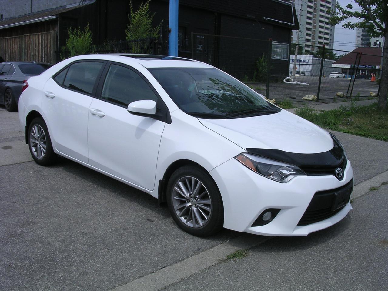 2014 Toyota Corolla 4dr Sdn CVT LE - Photo #2