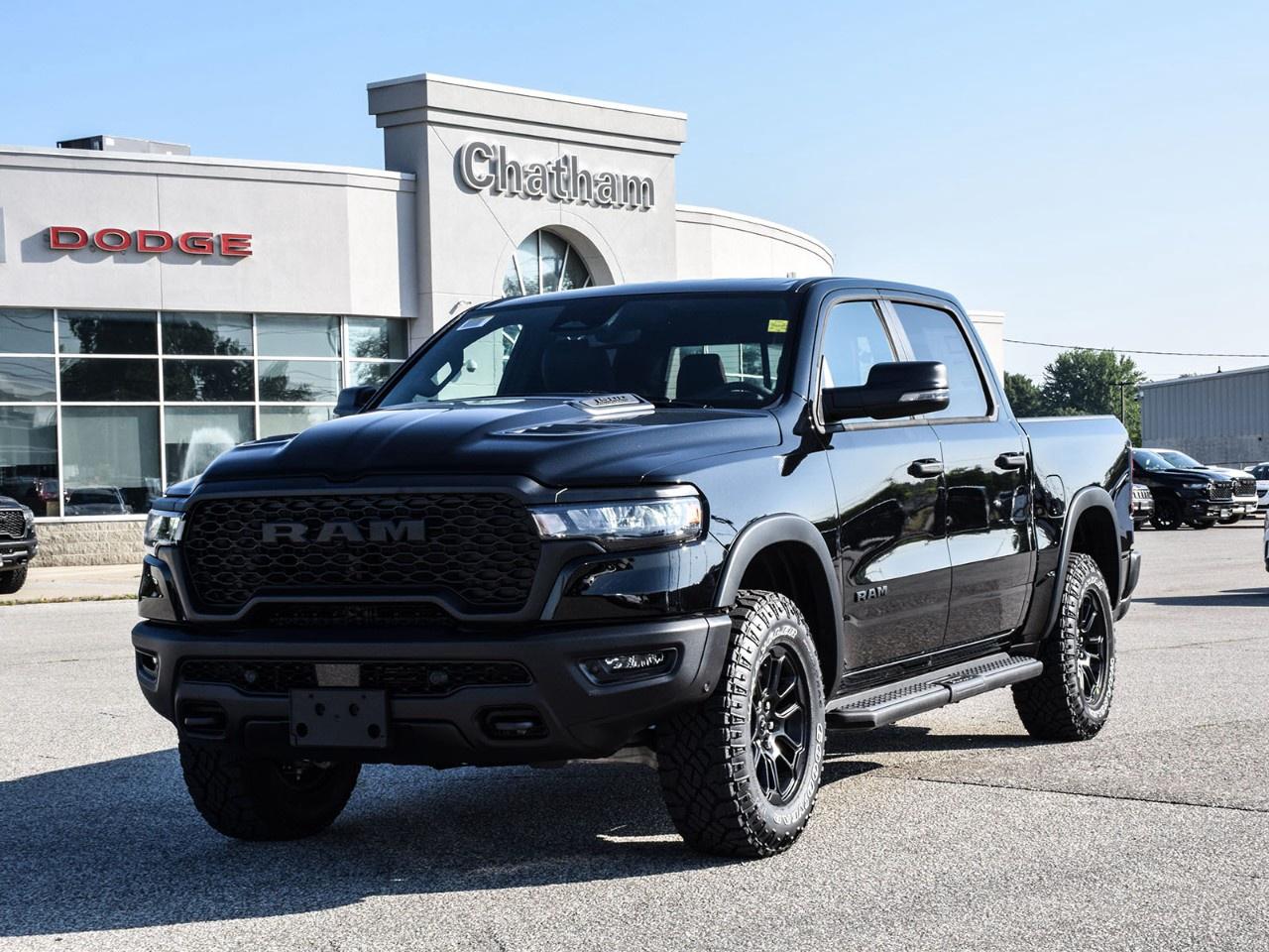 <p>Experience the unparalleled strength and capability of the brand-new 2026 Ram 1500 Rebel, draped in a commanding black hue and built to tackle any terrain with its robust 4x4 drivetrain. Perfectly crafted to marry ruggedness with style, this truck is ready to drive you through both urban landscapes and off-road paths with confidence.</p><p>The exterior of the Ram 1500 Rebel exudes a bold presence, complemented by stylish alloy wheels that highlight its athletic stance. The crew cab configuration provides ample space for both passengers and cargo, while the black interior offers a refined and comfortable environment. With power seats, a leather steering wheel, and an array of technological features, this truck ensures every journey is as comfortable as it is exhilarating.</p><p>Inside, benefit from advanced technology with a convenient backup camera, satellite radio, and smart device integration, ensuring seamless connectivity whether you're on bustling city roads or secluded trails. Safety is paramountlane assist, adaptive cruise control, and parking sensors are just a few of the features designed to keep you and your passengers secure. Enjoy the added comforts of heated mirrors and a heated steering wheel to make cold weather driving a breeze.</p><p>The 2026 Ram 1500 Rebel is crafted for adventurers and families who crave power combined with comfort. Contact us today to find out more about this outstanding vehicle and take the next step towards owning a truck that truly matches your lifestyle needs.</p>