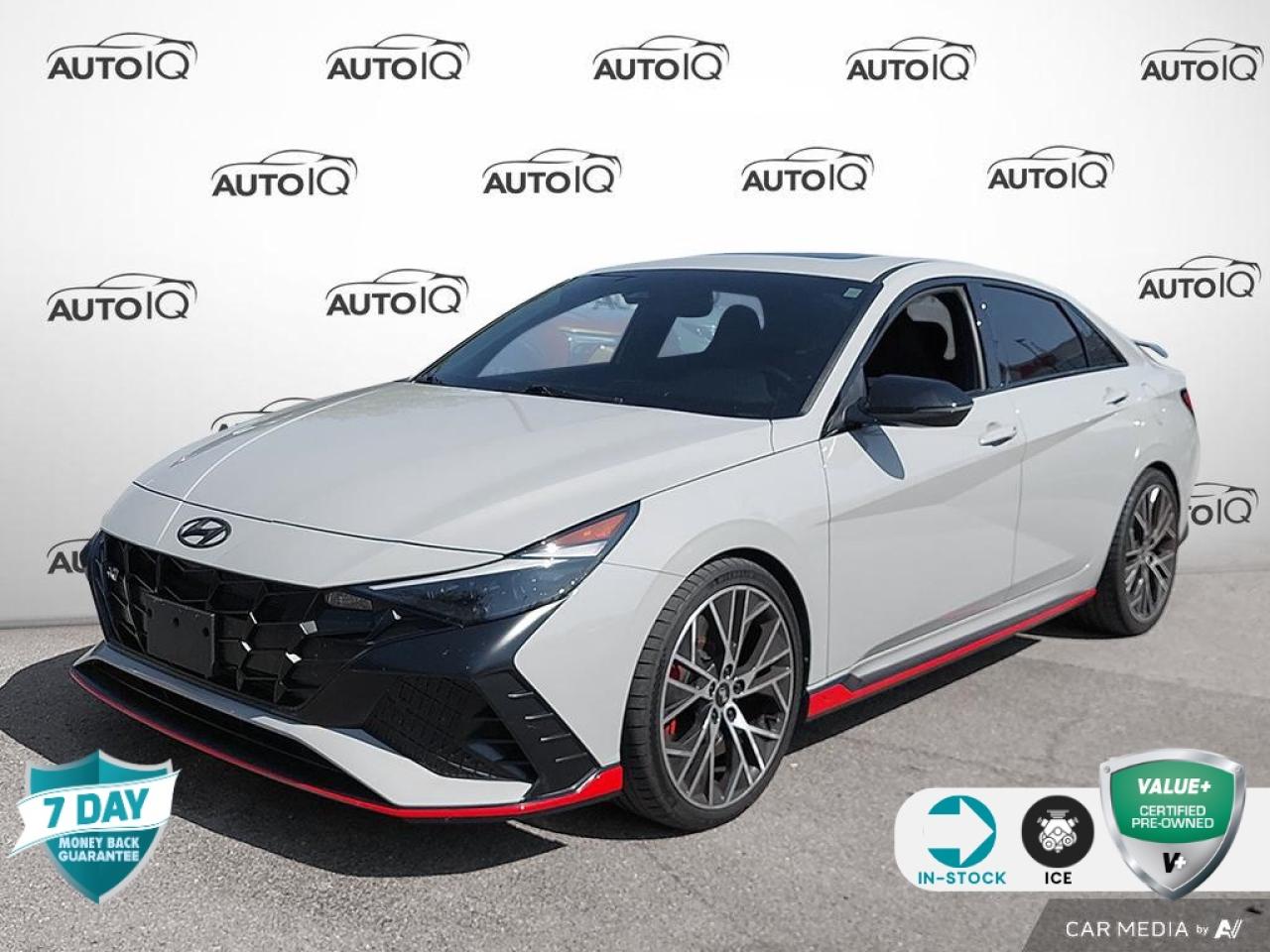 Recent Arrival!<br>Odometer is 6,891 kilometers below market average!<br><br>Performance Focused | Track-Ready | Everyday Practicality<br><br>Get behind the wheel of pure excitement with this 2023 Hyundai Elantra N in Cyber Gray. Engineered for drivers who crave precision and performance, the Elantra N delivers race-inspired handling with the comfort and tech of a modern sedan.<br><br>Key Performance Features:<br><br>2.0L Turbocharged Engine paired with a 6-speed manual transmission for total control<br><br>Sport-tuned suspension and chassis for confident cornering<br><br>Front-wheel drive with exceptional balance and responsiveness<br><br>Comfort & Tech Highlights:<br><br>Heated sport bucket seats with suede/leatherette trim<br><br>Heated steering wheel and dual-zone climate control<br><br>Apple CarPlay & Android Auto for seamless smartphone connectivity<br><br>Power moonroof and rearview camera for added convenience<br><br>Exterior Details:<br><br>Bold 19 Black Pearl Machine Finish Alloy Wheels<br><br>Aerodynamic rear spoiler and aggressive body styling<br><br>Finished in stunning Cyber Gray Metallic<br><br>Whether youre carving up back roads or navigating daily commutes, the 2023 Elantra N offers the perfect blend of thrilling performance and everyday usability.<br><br>Dont miss your chance to own Hyundais award-winning performance sedan. Schedule a test drive today!<p></p>

<h4>VALUE+ CERTIFIED PRE-OWNED VEHICLE</h4>

<p>36-point Provincial Safety Inspection<br />
172-point inspection combined mechanical, aesthetic, functional inspection including a vehicle report card<br />
Warranty: 30 Days or 1500 KMS on mechanical safety-related items and extended plans are available<br />
Complimentary CARFAX Vehicle History Report<br />
2X Provincial safety standard for tire tread depth<br />
2X Provincial safety standard for brake pad thickness<br />
7 Day Money Back Guarantee*<br />
Market Value Report provided<br />
Complimentary 3 months SIRIUS XM satellite radio subscription on equipped vehicles<br />
Complimentary wash and vacuum<br />
Vehicle scanned for open recall notifications from manufacturer</p>

<p>SPECIAL NOTE: This vehicle is reserved for AutoIQs retail customers only. Please, No dealer calls. Errors & omissions excepted.</p>

<p>*As-traded, specialty or high-performance vehicles are excluded from the 7-Day Money Back Guarantee Program (including, but not limited to Ford Shelby, Ford mustang GT, Ford Raptor, Chevrolet Corvette, Camaro 2SS, Camaro ZL1, V-Series Cadillac, Dodge/Jeep SRT, Hyundai N Line, all electric models)</p>