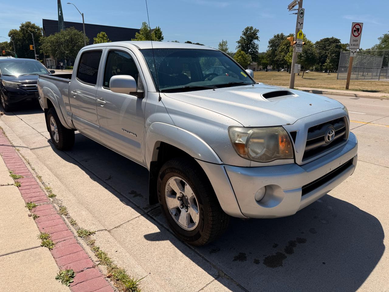 2009 Toyota Tacoma 4WD Double LB V6 AT (Natl) Photo4