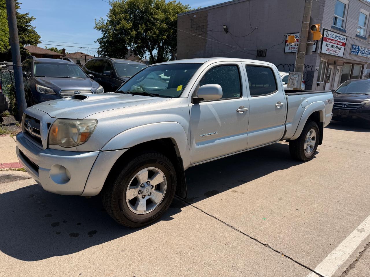 2009 Toyota Tacoma 4WD Double LB V6 AT (Natl) - Photo #4