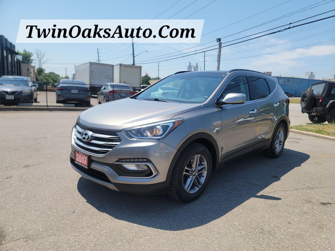 <p data-start=95 data-end=131><strong data-start=95 data-end=131>2017 Hyundai Santa Fe SE AWD 2.4</strong></p><p data-start=133 data-end=358>This 2017 Hyundai Santa Fe SE with All-Wheel Drive and the fuel-efficient 2.4L engine offers a perfect balance of performance, comfort, and practicality. Well-maintained and very clean, it&rsquo;s ready for any season and any road.</p><p data-start=360 data-end=377><strong data-start=360 data-end=377>Key Features:</strong></p><ul data-start=379 data-end=1314><li data-start=379 data-end=409><p data-start=381 data-end=409>2.4L GDI 4-cylinder engine</p></li><li data-start=410 data-end=472><p data-start=412 data-end=472>6-speed automatic transmission with SHIFTRONIC manual mode</p></li><li data-start=473 data-end=528><p data-start=475 data-end=528>All-Wheel Drive (AWD) with Active Cornering Control</p></li><li data-start=529 data-end=571><p data-start=531 data-end=571>Drive Mode Select (Eco, Normal, Sport)</p></li><li data-start=572 data-end=612><p data-start=574 data-end=612>Spacious interior with seating for 5</p></li><li data-start=613 data-end=641><p data-start=615 data-end=641>Premium leather upholstery</p></li><li data-start=642 data-end=664><p data-start=644 data-end=664>Heated front seats</p></li><li data-start=665 data-end=719><p data-start=667 data-end=719>Power-adjustable driver&rsquo;s seat with lumbar support</p></li><li data-start=720 data-end=759><p data-start=722 data-end=759>Dual-zone automatic climate control</p></li><li data-start=760 data-end=800><p data-start=762 data-end=800>Rear air vents for passenger comfort</p></li><li data-start=801 data-end=836><p data-start=803 data-end=836>Touchscreen infotainment system</p></li><li data-start=837 data-end=882><p data-start=839 data-end=882>AM/FM/CD/MP3 with USB and auxiliary input</p></li><li data-start=883 data-end=935><p data-start=885 data-end=935>Bluetooth hands-free calling and audio streaming</p></li><li data-start=936 data-end=988><p data-start=938 data-end=988>Steering wheel-mounted audio and cruise controls</p></li><li data-start=989 data-end=1008><p data-start=991 data-end=1008>Rearview camera</p></li><li data-start=1009 data-end=1037><p data-start=1011 data-end=1037>Keyless entry with alarm</p></li><li data-start=1038 data-end=1062><p data-start=1040 data-end=1062>17-inch alloy wheels</p></li><li data-start=1063 data-end=1093><p data-start=1065 data-end=1093>LED daytime running lights</p></li><li data-start=1094 data-end=1136><p data-start=1096 data-end=1136>Big Beautiful Sunroof&nbsp;</p></li><li data-start=1137 data-end=1196><p data-start=1139 data-end=1196>60/40 split-folding rear seats for expanded cargo space</p></li><li data-start=1197 data-end=1314><p data-start=1199 data-end=1314>Advanced safety features including Electronic Stability Control, Traction Control System, ABS, and multiple airbags</p></li></ul><p data-start=1316 data-end=1462>This Santa Fe is a great family SUV with all the features needed for comfort, safety, and reliability. Ideal for both city driving and long trips.</p><p data-start=1464 data-end=1519>Contact for more information or to book a test drive.</p><p><strong>Additional Certification Cost</strong>: The full certification cost for this vehicle is <strong>$790 + HST</strong>.</p><p><strong>What&rsquo;s Included with Certification</strong>:</p><ul><li>The vehicle will be delivered with a <strong>valid safety certification</strong> and a <strong>36-day safety item warranty</strong> for your peace of mind.</li><li>A <strong>fresh oil change</strong> will be performed, and all fluids will be topped up.</li><li>The vehicle will be <strong>professionally detailed</strong>, ensuring it looks and feels like new when you pick it up.</li></ul><p>At <strong>Twin Oaks Auto</strong>, we are committed to providing a <strong>hassle-free car buying experience</strong>. From your first inquiry to driving off in your new car, our goal is to get you on the road quickly and stress-free!</p><p><strong>Financing Options Available!</strong><br>Flexible financing options are available to suit your needs. Contact us for more details.</p><p><strong>Contact Us Today</strong>:<br>📞 <strong>Call Us</strong>: 905-339-3330<br>📍 <strong>Location</strong>: 2470 Royal Windsor Drive, Oakville, Ontario, L6J 7Y2</p><p><br>(Conveniently located between Ford Drive and Winston Churchill Blvd.)</p><p><strong>More Information</strong>:<br>Visit our website at <strong><a href=http://www.twinoaksauto.com>TwinOaksAuto.com</a></strong> to view additional pictures, explore our inventory, and access CARFAX reports.</p><p>&nbsp;</p>