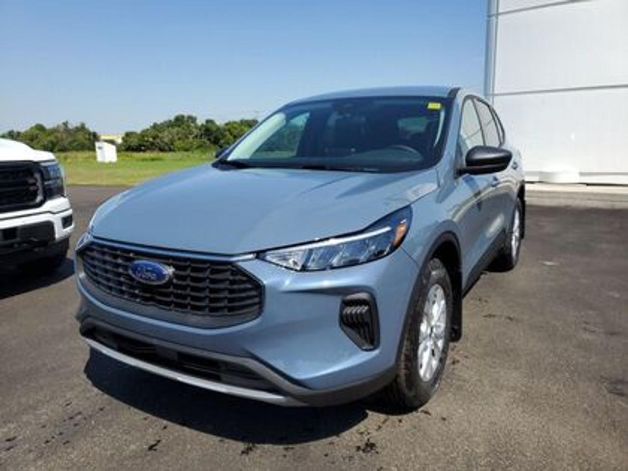 This all-new 2025 Escape Active 200A looks absolutely stunning in Vapor Blue Metallic. This 5-passenger All-wheel drive crossover comes equipped with the 1.5L EcoBoost® engine. This remarkable engine not only produces 181 horsepower and 190 ft-lbs of torque, but by leveraging EcoBoost® technology and an 8-speed automatic transmission, this crossover is rated to get an estimated 8.4L/100km (34 miles per gallon) combined highway/city fuel economy.

Key Features:
8 Instrument panel cluster
 All-wheel drive
Ford Co-Pilot360
Heated Front Seats
Remote Start
Heated Mirrors
SYNC® 4 W/8 LCD Capacitive Touchscreen
Wireless Apple CarPlay® and Android Auto Compatibility
Privacy Glass
17 Shadow Silver Painted Aluminum Wheels
Power Windows
LED Taillamps
LED Headlamps
FordPass Connect
Mini Spare Wheel/Tire

Moose Jaw Ford, conveniently located at 1010 North Service Road in Moose Jaw, is your trusted destination for all your automotive needs. With an impressive 4.8-star Google rating from nearly 1,500 reviews, we are proud to deliver an exceptional vehicle-buying experience tailored just for you. Our Moose Jaw Motives set us apart, offering unbeatable value like half-priced oil changes for life on pre-owned vehicles, one year of key and remote protection, and one year of tire and rim protection. Enjoy peace of mind with every purchase. At Moose Jaw Ford, were committed to driving positive change in our community by combining exceptional service, high-quality vehicles, and a guest-first approach. Visit us today!