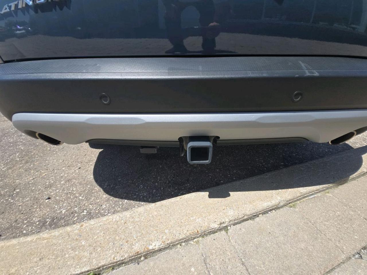 12807877