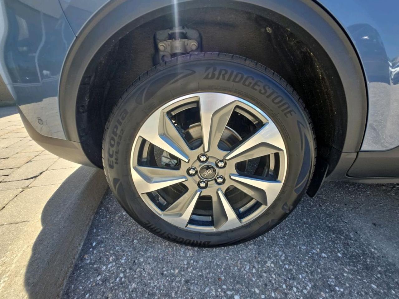 12807877