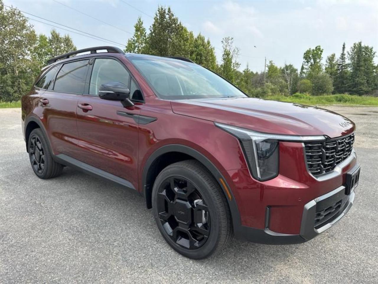 <b>Navigation GPS, Leather Seats, Heated Steering Wheel, Heated Seats, Power Driver Seat, 12.3 Multimedia Interface, Sirius XM (3 month free trial), Kia Connect (3 years free trial), Blind Spot Detection, Lane Keep Assist, Push Button Start<br> <br></b><br>  <br> <br>  With a versatile cabin, a ton of connective features, and endless luxury features, this 2025 Sorento offers comfort in every row. <br> <br>With comfort in every versatile row, this powerful and refined 2025 Sorento is ready to offer you a drive like no other. This SUV was designed to go all the way no matter where you go, and get you there in comfort and style. With amazing technology and versatility in every nook and cranny, this 2025 Sorento is ready for more than adventure, its ready to be character in your story. Try out the future of SUVs today in this 2025 Kia Sorento.<br> <br> This dawning red SUV  has a 8 speed automatic transmission and is powered by a  281HP 2.5L 4 Cylinder Engine.<br> <br> Our Sorentos trim level is X-Line. A dual-panel sunroof, inbuilt navigation and highway driving assistance are among the many upgrades you enjoy with this Sorento X-Line. Also standard include a power liftgate for rear cargo access, a heated steering wheel, dual-zone climate control and artificial leather seating upholstery, along with great additional features such as heated front seats, mobile hotspot internet access, adaptive cruise control, proximity keyless entry, and a 12.3-inch infotainment screen with Apple CarPlay, Android Auto, and Kia Connect. Safety features also include lane keeping assist with lane departure warning, blind spot detection, front and rear parking sensors, and front and rear collision mitigation. This vehicle has been upgraded with the following features: Air, Rear Air, Tilt, Cruise, Power Windows, Power Locks, Power Mirrors. <br><br> <br>To apply right now for financing use this link : <a href=https://www.kiaoftimmins.com/timmins-ontario-car-loan-application target=_blank>https://www.kiaoftimmins.com/timmins-ontario-car-loan-application</a><br><br> <br/> See dealer for details. <br> <br>As a local, family owned and operated dealership we look to be your number one place to buy your new vehicle! Kia of Timmins has been serving a large community across northern Ontario since 2001 and focuses highly on customer satisfaction. Our #1 priority is to make you feel at home as soon as you step foot in our dealership. Family owned and operated, our business is in Timmins, Ontario the city with the heart of gold. Also positioned near many towns in which we service such as: South Porcupine, Porcupine, Gogama, Foleyet, Chapleau, Wawa, Hearst, Mattice, Kapuskasing, Moonbeam, Fauquier, Smooth Rock Falls, Moosonee, Moose Factory, Fort Albany, Kashechewan, Abitibi Canyon, Cochrane, Iroquois falls, Matheson, Ramore, Kenogami, Kirkland Lake, Englehart, Elk Lake, Earlton, New Liskeard, Temiskaming Shores and many more.We have a fresh selection of new & used vehicles for sale for you to choose from. If we dont have what you need, we can find it! All makes and models are within our reach including: Dodge, Chrysler, Jeep, Ram, Chevrolet, GMC, Ford, Honda, Toyota, Hyundai, Mitsubishi, Nissan, Lincoln, Mazda, Subaru, Volkswagen, Mini-vans, Trucks and SUVs.<br><br>We are located at 1285 Riverside Drive, Timmins, Ontario. Too far way? We deliver anywhere in Ontario and Quebec!<br><br>Come in for a visit, call 1-800-661-6907 to book a test drive or visit <a href=https://www.kiaoftimmins.com>www.kiaoftimmins.com</a> for complete details. All prices are plus HST and Licensing.<br><br>We look forward to helping you with all your automotive needs!<br><br> Come by and check out our fleet of 20+ used cars and trucks and 20+ new cars and trucks for sale in Timmins.  o~o