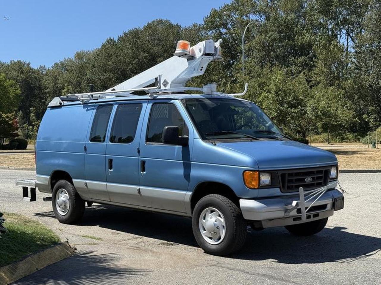 2006 Ford Econoline E-350 Cargo Van with Versalift Bucket, 5.4L, 8 cylinder, 3 door, automatic, RWD, 4-Wheel ABS, AM/FM radio, blue exterior, grey interior, cloth. Versalift VT28B 29 height, Go Power 1500W inverter, Alpine IVA-W205 head unit, beacon lights.  $26,720.00 plus $375 processing fee, $27,095.00 total payment obligation before taxes.   Listing report, warranty, contract commitment cancellation fee, financing available on approved credit (some limitations and exceptions may apply). All above specifications and information is considered to be accurate but is not guaranteed and no opinion or advice is given as to whether this item should be purchased. We do not allow test drives due to theft, fraud, acts of vandalism and undetectable impaired driving. Instead we provide the following benefits: Complimentary Warranty (with options to extend), Limited Money Back Satisfaction Guarantee on Fully Completed Contracts, Contract Commitment Cancellation, and an Open-Ended Sell-Back Option. Ask seller for details or call 604-522-REPO(7376) to confirm listing availability.