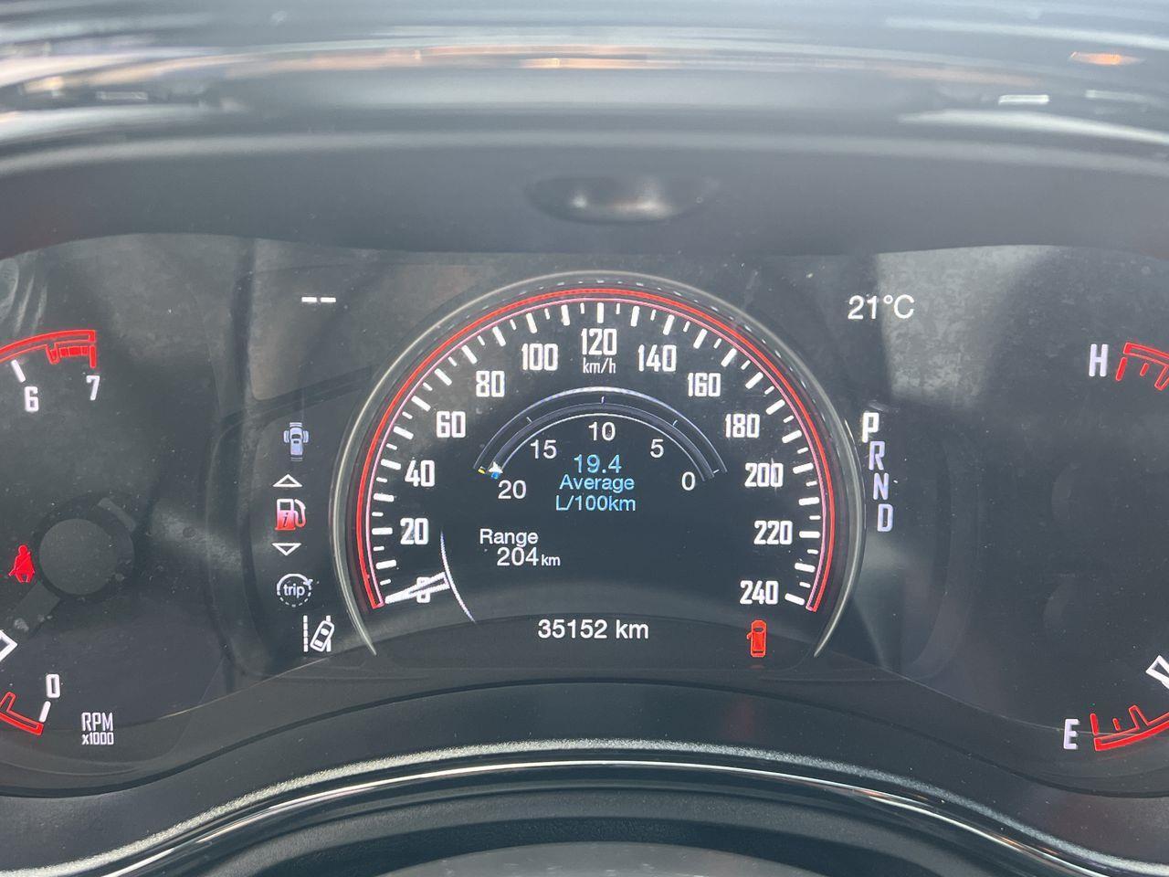 12815233