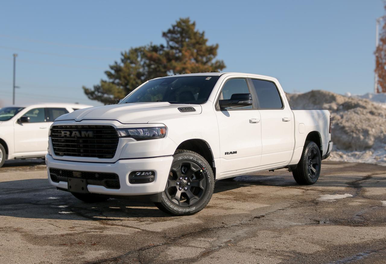 Bold and refined, our New 2026 RAM 1500 Sport Crew Cab 4X4 in Bright White delivers stylish strength that stands out anywhere. Motivated by a Twin-TurboCharged 3.0 Litre Hurricane 6 Cylinder generating 420hp for an 8 Speed Automatic transmission. This Four Wheel Drive truck loves to tow and haul with that setup, and it achieves approximately 9.7L/100km on the highway. Dynamic exterior details include LED lighting, fog lamps, 20-inch black alloy wheels, a damped tailgate, and heated power-folding mirrors.  Our Sport cabin is specially crafted for active owners who prefer features like heated cloth front seats, 12-way power for the driver, a leather-wrapped steering wheel, dual-zone automatic climate control, power-adjustable pedals, remote start, keyless access/ignition, a powered rear window, and top-shelf technologies. The Uconnect&reg; infotainment system bundles a 12-inch touchscreen, a 12-inch driver display, full-colour navigation, voice recognition, Apple CarPlay&reg;, Android Auto&reg;, Bluetooth&reg;, and 10-speaker audio.  RAM encourages safer trucking with automatic braking, forward collision warning, a surround-view camera system, trailer-compatible blind-spot monitoring, rear cross-traffic alert, trailer-sway damping, electronic stability/traction control, hill start assist, and more. Committed to truck leadership, our 1500 Sport is a compelling choice! Save this Page and Call for Availability. We Know You Will Enjoy Your Test Drive Towards Ownership!
