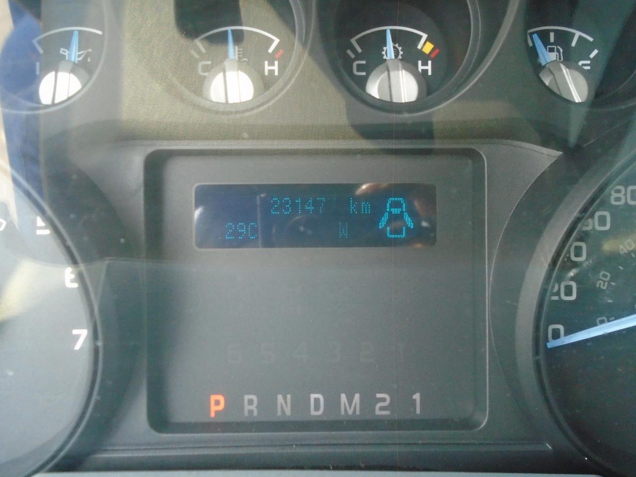 12830986