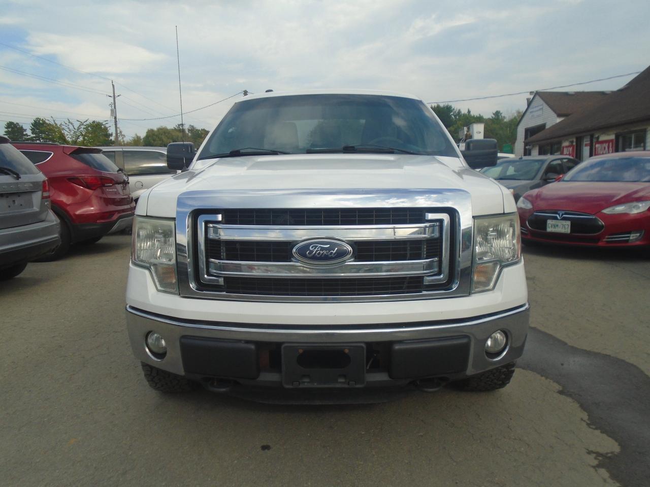 2014 Ford F-150 4WD SuperCab 145  XLT - Photo #3