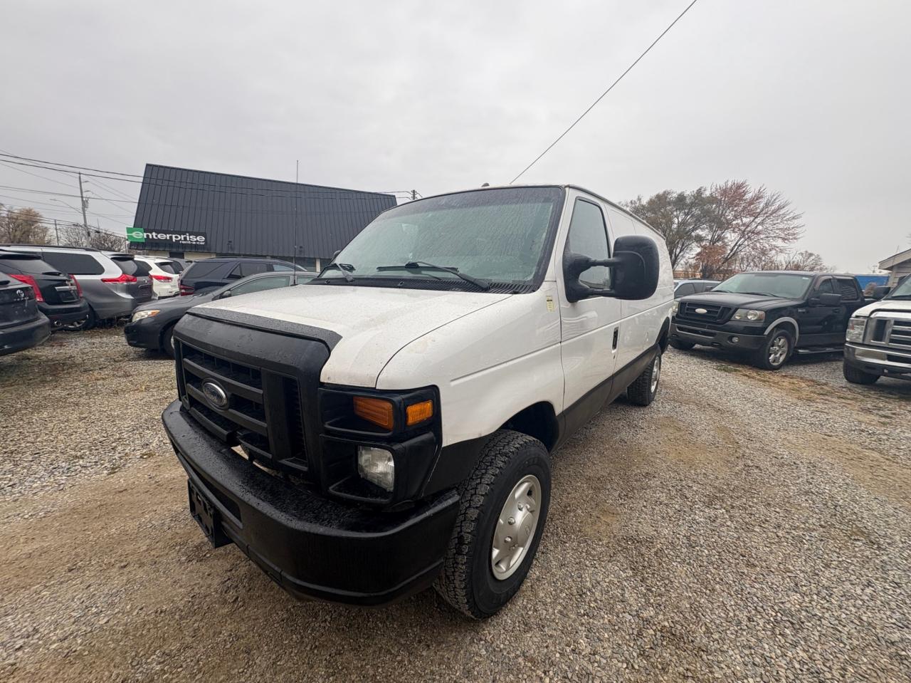 2009 Ford Econoline E-350 Super Cargo Van, Low KM, No Rust with Safety & 1 year Premium Warranty Photo