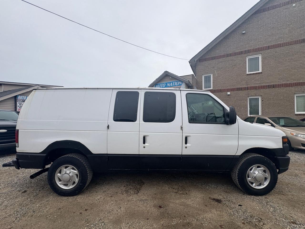 2009 Ford Econoline E-350 Super Cargo Van, Low KM, No Rust with Safety & 1 year Premium Warranty Photo