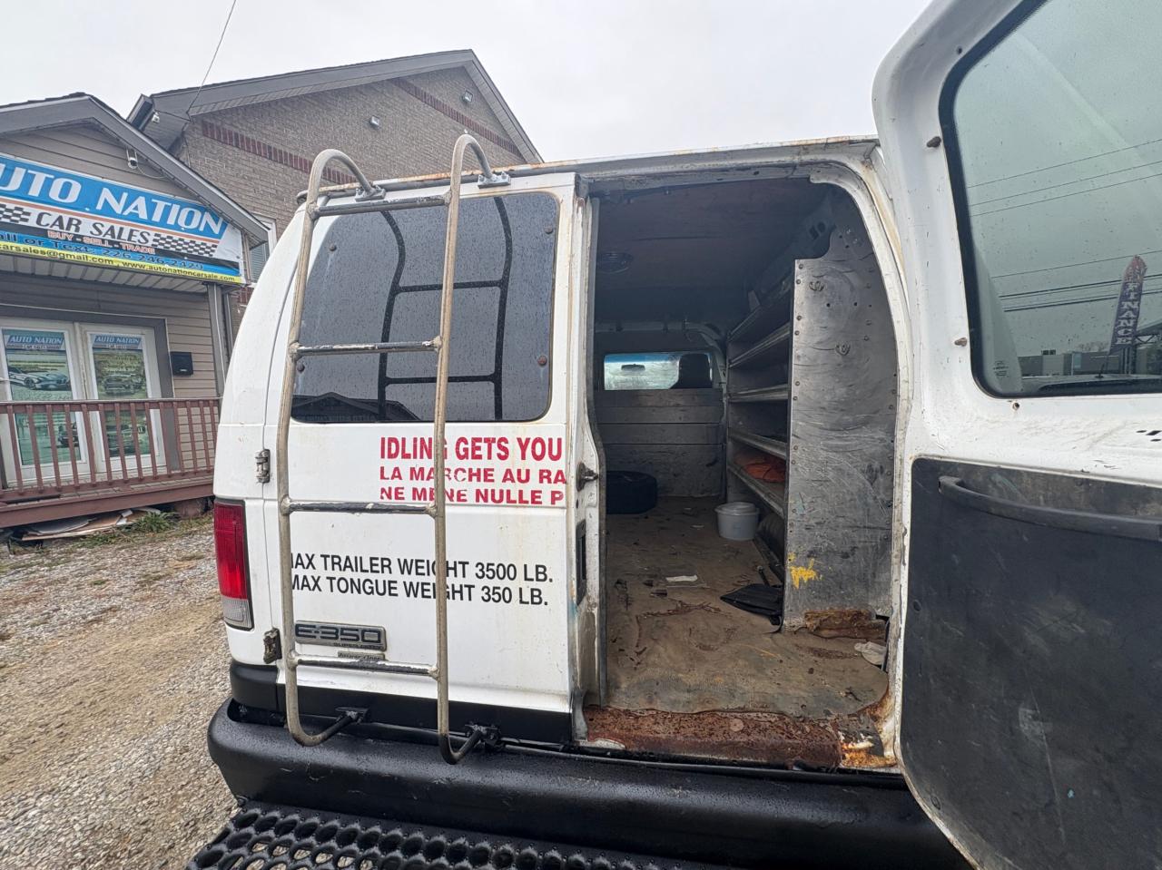 2009 Ford Econoline E-350 Super Cargo Van, Low KM, No Rust with Safety & 1 year Premium Warranty Photo