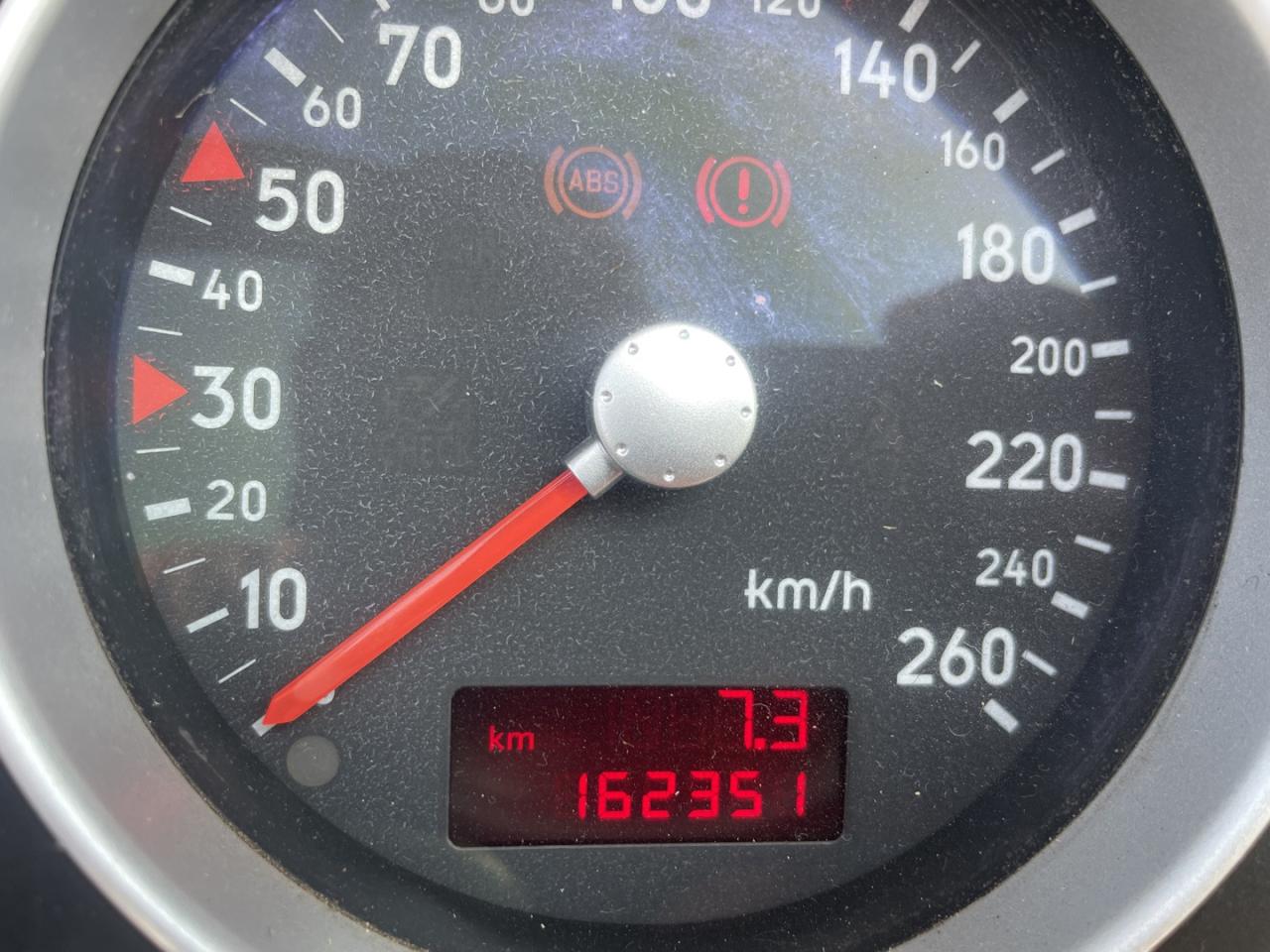 12834211