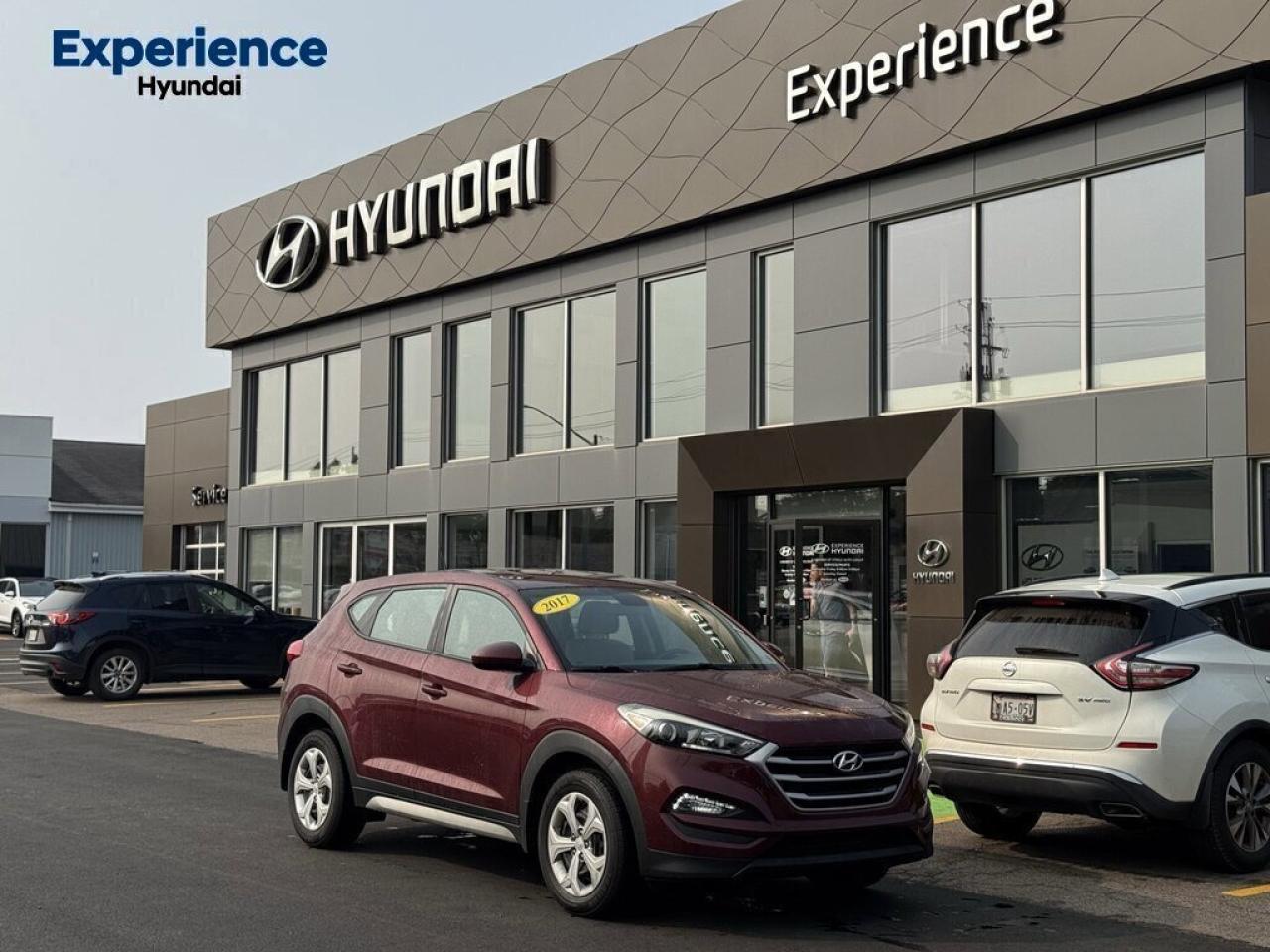 Take the worry out of buying with this impeccable 2017 Hyundai Tucson. Side Impact Beams, Rear Child Safety Locks, Outboard Front Lap And Shoulder Safety Belts -inc: Rear Centre 3 Point, Height Adjusters and Pretensioners, Electronic Stability Control (ESC), Dual Stage Driver And Passenger Seat-Mounted Side Airbags. 
 
Fully-Loaded with Additional Options
RUBY WINE, GREY, CLOTH SEAT TRIM, Wheels: 17 x 7.0 Steel, Wheels w/Full Wheel Covers, Variable Intermittent Wipers w/Heated Wiper Park, Urethane Gear Shifter Material, Trip Computer, Transmission: 6-Speed Automatic w/OD, Transmission w/Driver Selectable Mode and SHIFTRONIC Sequential Shift Control, Tires: P225/60R17 All-Season.
 
 Visit Us Today 
 Youve earned this- stop by Experience Hyundai located at 15 Mount Edward Rd, Charlottetown, PE C1A 5R7 to make this car yours today! 
 Were PEIs Premier Credit Specialists! Good poor, bad, or new credit? Divorced? Self-Employed? We have you covered! Our Credit Specialists are on standby 24/7 to help get you behind the wheel today! APPLY FOR YOUR PRE-APPROVAL TODAY - https://www.steeleadvantagefinancing.com/7182