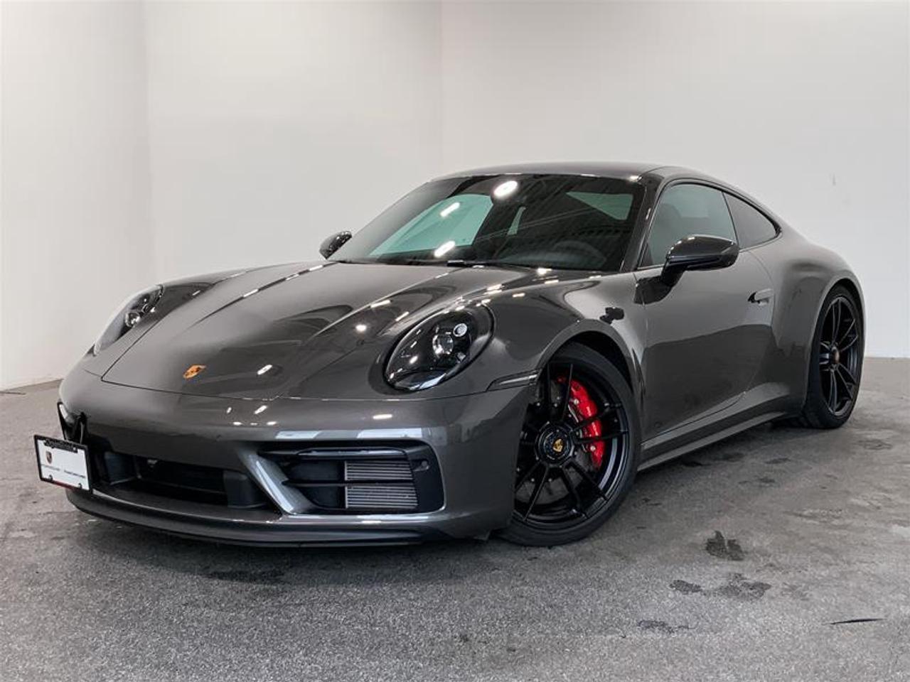 Highly Equipped with Premium Package, Porsche Dynamic Chassis Control (PDCC), Rear Axle Steering, BOSE Surround Sound System, Surround View Camera, Lane Change Assist (LCA), Multifunction GT Sport Steering Wheel in Carbon, and much more! This 2022 Porsche 911 Carrera GTS Coupe comes in Agate Grey Metallic with a GTS Interior Package in Carmine Red! This Local BC Vehicle has been meticulously Kept by One Previous Owner with No Reported Accidents! This vehicle is a Porsche Approved Certified Pre-Owned Vehicle: 2 extra years of unlimited mileage warranty plus an additional 2 years of Porsche Roadside Assistance. All CPO vehicles have passed our rigorous 111-point check and reconditioned with 100% genuine Porsche parts. We Accept All Trade-Ins and Buy-Ins!! For more details or to schedule a test drive with one of our highly trained sales executives, please send us a website inquiry before it&rsquo;s gone. Porsche Centre Langley has proudly earned the Porsche Premier Dealer Award eight years in a row. Conveniently located just off Highway 1 in Langley, British Columbia, we are committed to helping you find and drive your dream vehicle. Please note: A $599 documentation fee and a $690 dealer preparation fee apply to all pre-owned vehicles. Dealer #40136.