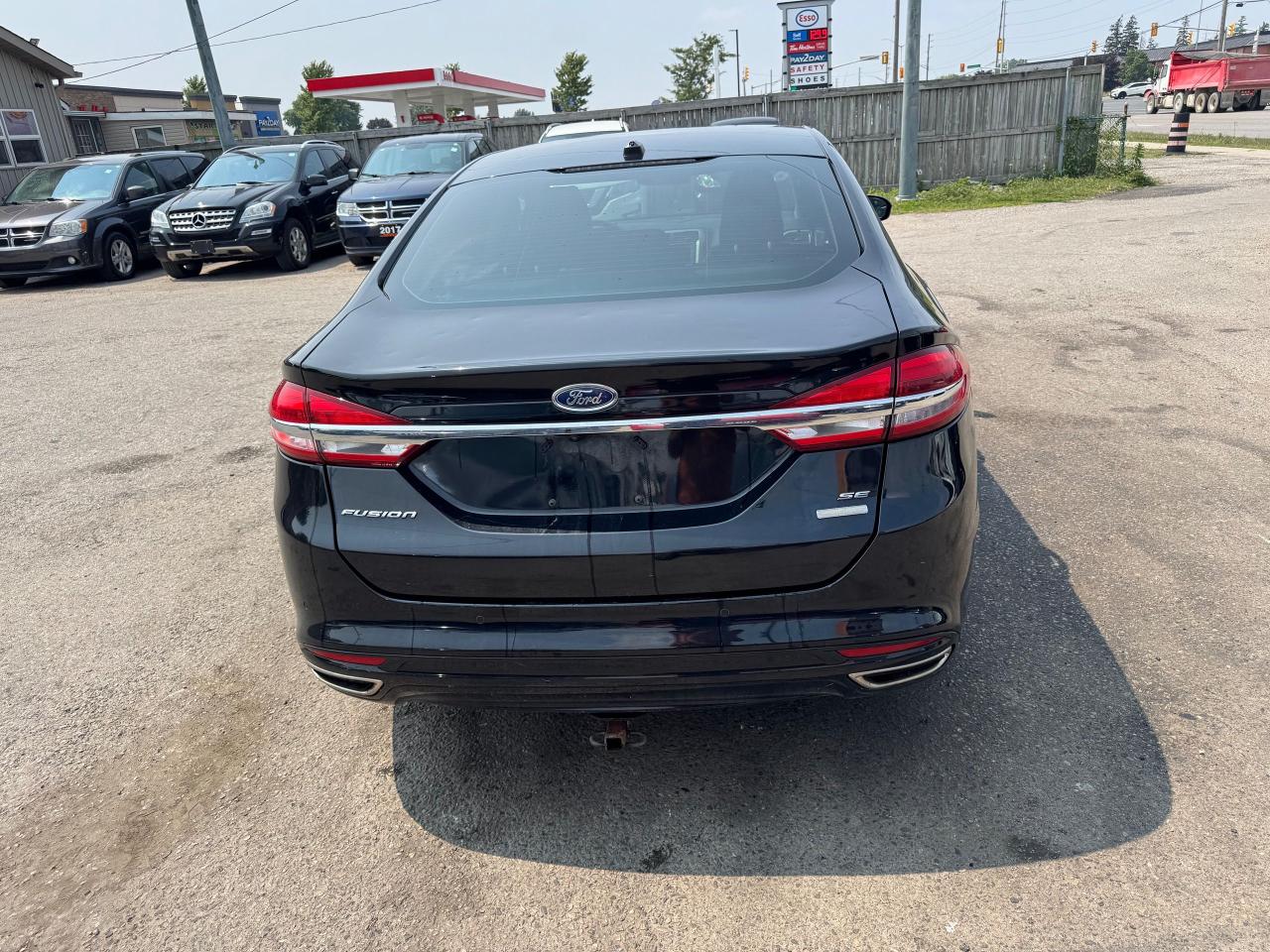 2017 Ford Fusion SE, LEATHER, SUNROOF, ALLOYS, 4 CYL, LOADED, CERT - Photo #4