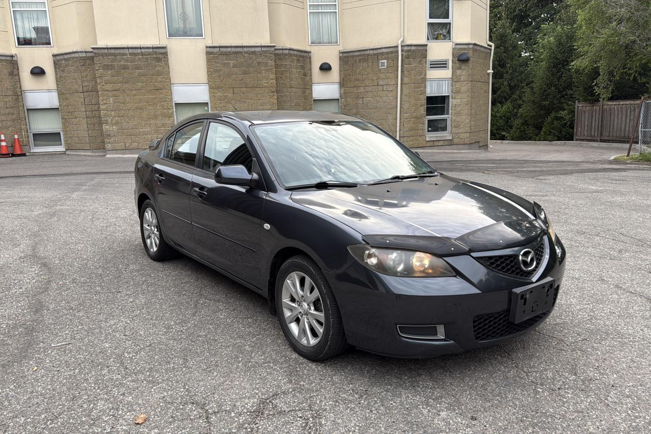 2009 Mazda MAZDA3 4dr Sdn Auto GX Photo2