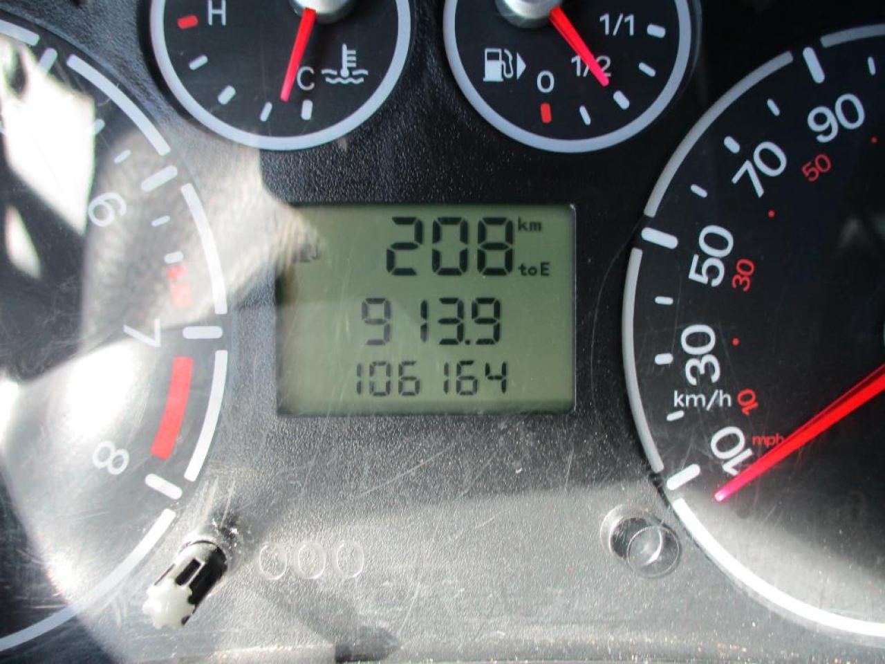 12843946