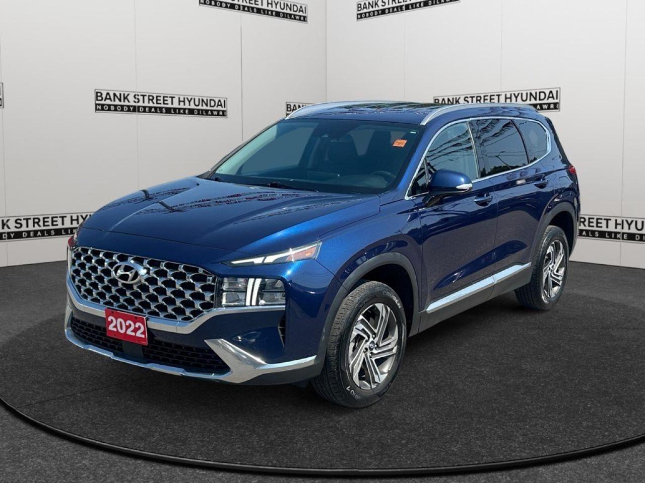 The 2022 Hyundai Santa Fe Preferred AWD in a striking blue finish offers an excellent driving experience with its capable all-wheel drive system and smooth handling. This SUV is designed for those who value performance and style, boasting a 2.5L 4-cylinder engine that delivers power efficiently. The Santa Fes exterior is accentuated by modern alloy wheels and a confident profile. Inside, youll find thoughtfully laid-out features such as heated seats and a leather steering wheel, providing comfort for every journey. This Preferred trim includes key convenience options like power seats and windows, keyless entry, and remote start, ensuring every drive is both enjoyable and effortless. Stay connected and safe with advanced technology including a backup camera, bluetooth connection, and smart device integration. Enjoy peace of mind with driver assistance features such as lane assist, adaptive cruise control, and parking sensors. The 2022 Hyundai Santa Fe also embraces comfort with a heated steering wheel and heated mirrors, making it an ideal choice for Canadian winters. If youre a driver seeking a reliable and feature-rich vehicle with a touch of elegance, the 2022 Hyundai Santa Fe Preferred AWD is a perfect match. Contact us today to learn more and take this remarkable SUV for a test drive!
