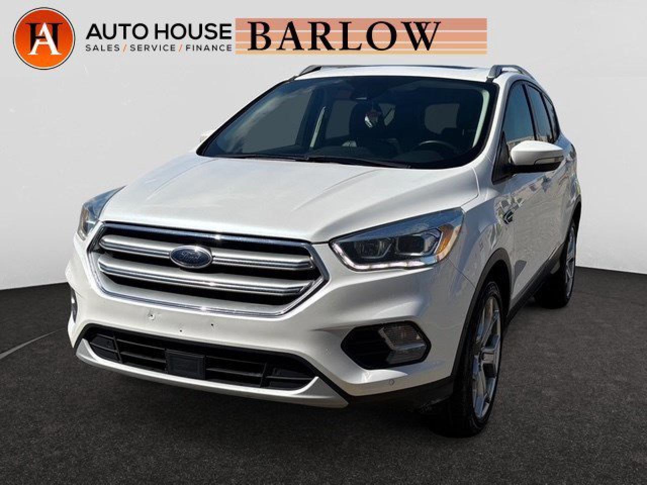 2017 FORD ESCAPE TITANIUM WITH 139867 KMS, 4WD, NAVIGATION, BACKUP CAMERA, SUNROOF, LANE ASSIST, BLIND SPOT DETECTION, DRIVE MODES, PADDLE SHIFTER, HEATED STEERING WHEEL, LEATHER SEATS, HEATED FRONT SEATS, MEMORY SEATS, PUSH BUTTON START, AUTO STOP/START, BLUETOOTH, USB/AUX, POWER WINDOWS LOCKS SEATS AND MORE!.ALL CREDIT ACCEPTED!One month at a job? Bankruptcy? New to Canada? Collections? Student or work visas? Previous repossessions? Good or bad credit? Weve got you covered! Get pre-approved today at www.autoshouse.com!What We Offer:*Low Bi-Weekly Payments*Instant Approvals*Credit Consolidation*Employment Insurance*Negative Equity CoverageOperating Hours:Mon-Thurs: 10 am -- 8 pmFri-Sat: 10 am -- 6 pmCall 403-263-4446! All vehicles come with a full mechanical fitness assessment and CARFAX report.Referral Program:Refer friends and family and earn $500 for each referral!AMVIC Licensed DealerAfter a credit check, we can determine payments, APR, terms, and interest rates based on your credit (O.A.C). Individual credit will affect bi-weekly payments and the total cost of credit. Newer Vehicles May Come With Apple Carplay, Android Auto. Similar to Chevrolet, GMC, Honda, Toyota, Cadillac, Nissan, Ford, Volvo 2007, 2008, 2009, 2010, 2011, 2012, 2013, 2014, 2015, 2016, 2017, 2018Location: 2404 23rd Ave. N.E. Calgary AB, T2E 8J4CARFAX IS AVAILABLE TO THE CONSUMER.All photos are of the vehicle featured in the advertisement.