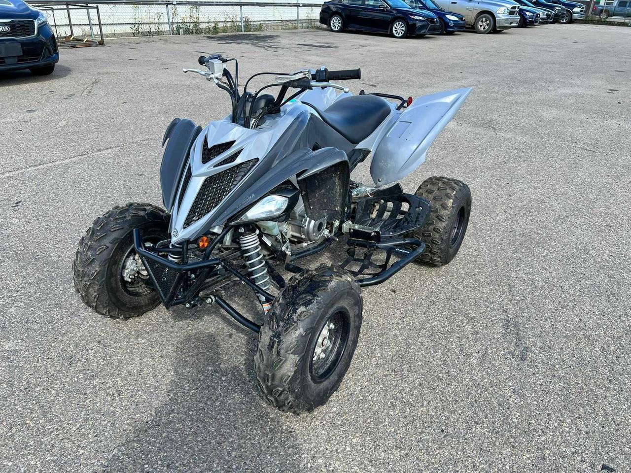 <p data-start=153 data-end=483>The 2018 Yamaha Raptor 700 is built for riders who want aggressive sport performance, confident handling, and proven big-bore power. Powered by a 686cc liquid-cooled, fuel-injected engine, this ATV delivers exceptional torque, strong acceleration, and the kind of top-end performance that makes it a legend in the sport ATV world.</p><p data-start=153 data-end=483>&nbsp;</p><p data-start=485 data-end=863>Purpose-built for speed and control, the Raptor 700 features a five-speed manual transmission with reverse, a lightweight hybrid steel and aluminum frame, and adjustable suspension to handle everything from wide-open dunes to tight, technical trails. The combination of long-travel suspension and a low center of gravity provides excellent stability without sacrificing agility.</p><p data-start=485 data-end=863>&nbsp;</p><p data-start=865 data-end=1097>With 22&rdquo; front and 20&rdquo; rear Maxxis tires on aluminum wheels, the Raptor grips hard and responds instantly to rider input. Hydraulic disc brakes on all four wheels deliver powerful stopping performance, even during aggressive riding.</p><p data-start=865 data-end=1097>&nbsp;</p><p data-start=1099 data-end=1360>This 1-seater also comes equipped with a comfortable sport seat, aggressive styling, and a digital display for key ride information. The lightweight construction and race-inspired ergonomics make it a perfect machine for riders chasing adrenaline on every ride.</p><p data-start=115 data-end=470>&nbsp;</p><p data-start=1362 data-end=1455 data-is-last-node= data-is-only-node=>Call or message us today to learn more about financing, trade-ins, or delivery across Canada.</p>