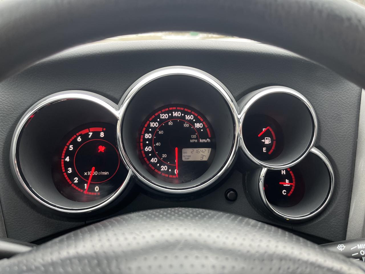 12855869