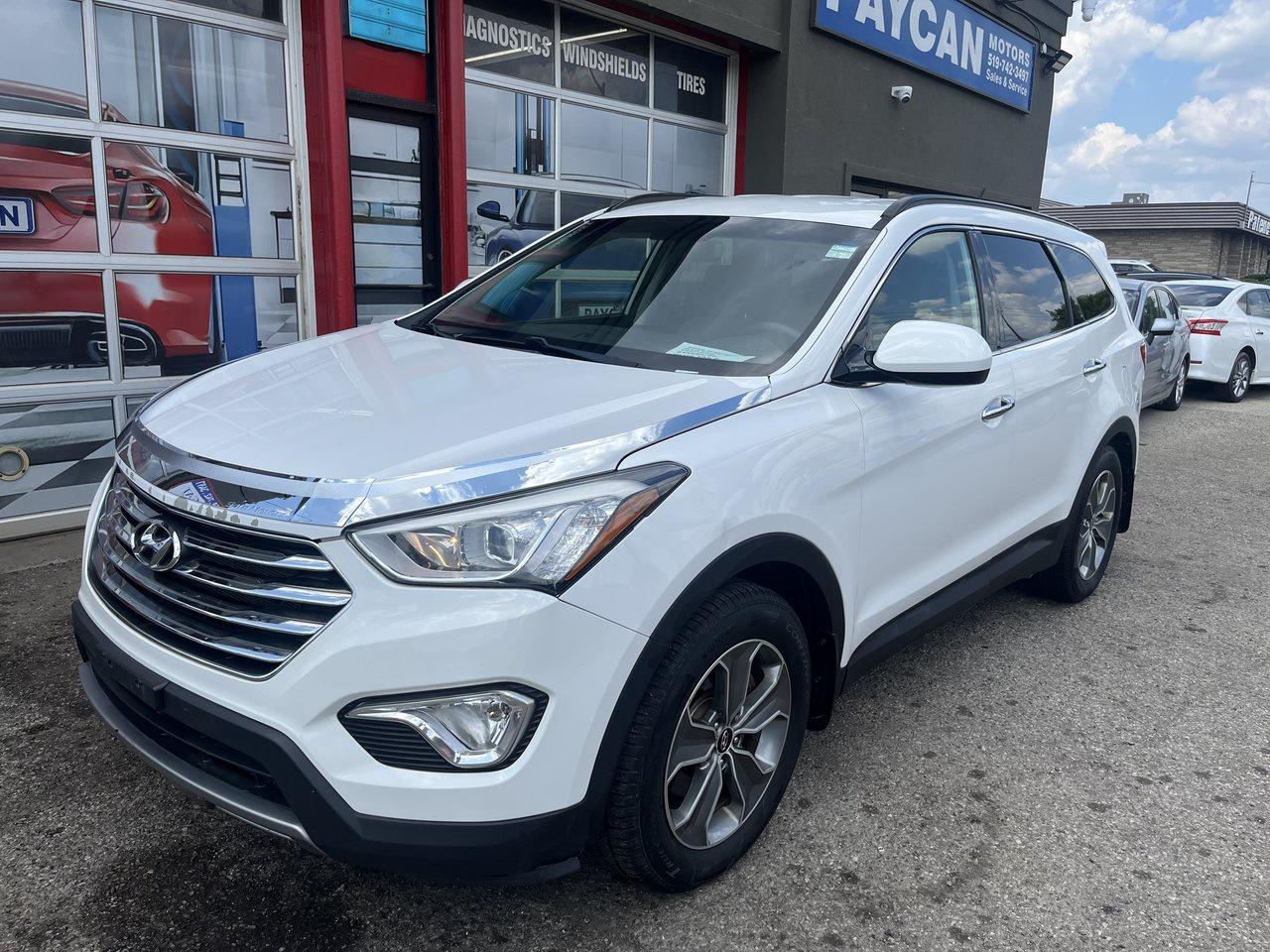 <p>WE HAVE A GREAT LOOKING SANTA FE 7 PASSENGER THAT LOOKS AND DRIVES GREAT WITH GREAT SERVICE RECORD AND RELIABLE SOLD CERTIFIED COME CHECK IT OUT OR CALL 5195706463 FOR AN APPOINTMENT .TO SEE ALL OUR INVENTORY PLS GO TO PAYCANMOTORS.CA</p>