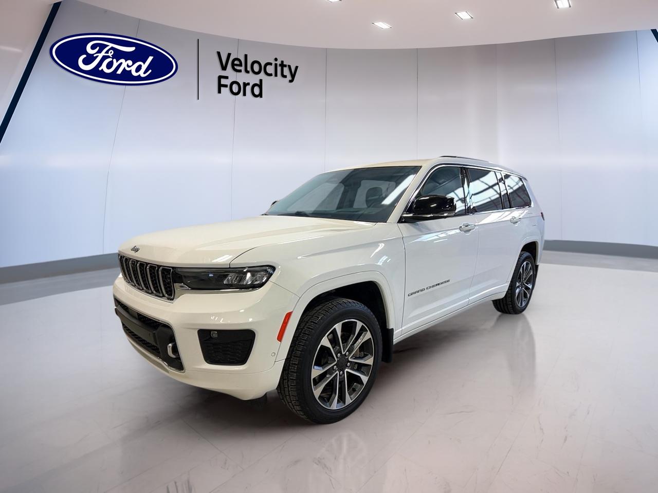 Experience refined capability and modern style with the 2021 Jeep Grand Cherokee L Overland, now available at Velocity Ford in Moose Jaw. Dressed in a striking white exterior, this used SUV delivers a blend of rugged performance and upscale comfort. The 3.6L Pentastar VVT V6 engine with ESS is paired to an 8-speed TorqueFlite automatic transmission, providing impressive power and smooth shifting. With four-wheel drive, the Grand Cherokee L Overland is ready for all Canadian seasons and terrains.

FEATURES OF THE Grand Cherokee L Overland  
»» Panoramic sunroof for a bright, open cabin  
»» Power liftgate for easy cargo access  
»» Adaptive cruise control for relaxed highway driving  
»» Premium audio system for immersive sound  

ADVANCED SAFETY FEATURES  
»» Blind-spot monitoring for safer lane changes  
»» Rear cross-path detection for added awareness  
»» Forward collision warning with active braking  
»» Lane departure warning for confident driving  

PERFORMANCE AND EFFICIENCY  
»» 3.6L Pentastar V6 engine with ESS technology  
»» 8-speed TorqueFlite automatic transmission  
»» Four-wheel drive for superior traction  
»» Smooth, responsive handling on various surfaces  

COMFORT AND CONVENIENCE  
»» Three-zone automatic climate control for all passengers  
»» Power-adjustable front seats with memory settings  
»» Heated steering wheel for cold mornings  
»» Ample legroom in all three rows  

TECHNONOLGY AND CONNECTIVITY  
»» Uconnect infotainment system with touchscreen display  
»» Integrated navigation for easy route planning  
»» Apple CarPlay and Android Auto compatibility  
»» Multiple USB ports for device charging  

CARGO SPACE  
»» Flexible rear seats for expanded cargo room  
»» Flat load floor for easy packing  
»» Power liftgate simplifies loading and unloading  
»» Ample storage for family adventures  

WHAT OTHER OWNERS LIKE  
»» Smooth, quiet ride on highways and city streets  
»» User-friendly infotainment and connectivity features  
»» Spacious third row for growing families  
»» Confident all-weather performance with four-wheel drive  

This 2021 Jeep Grand Cherokee L Overlands VIN is: 1C4RJKDG7M8165722.