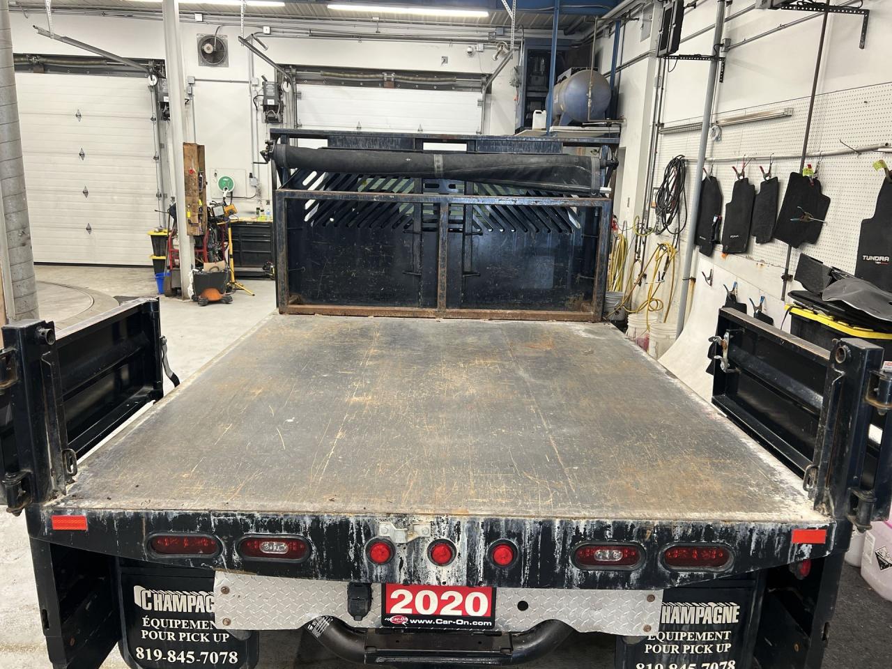 12860030