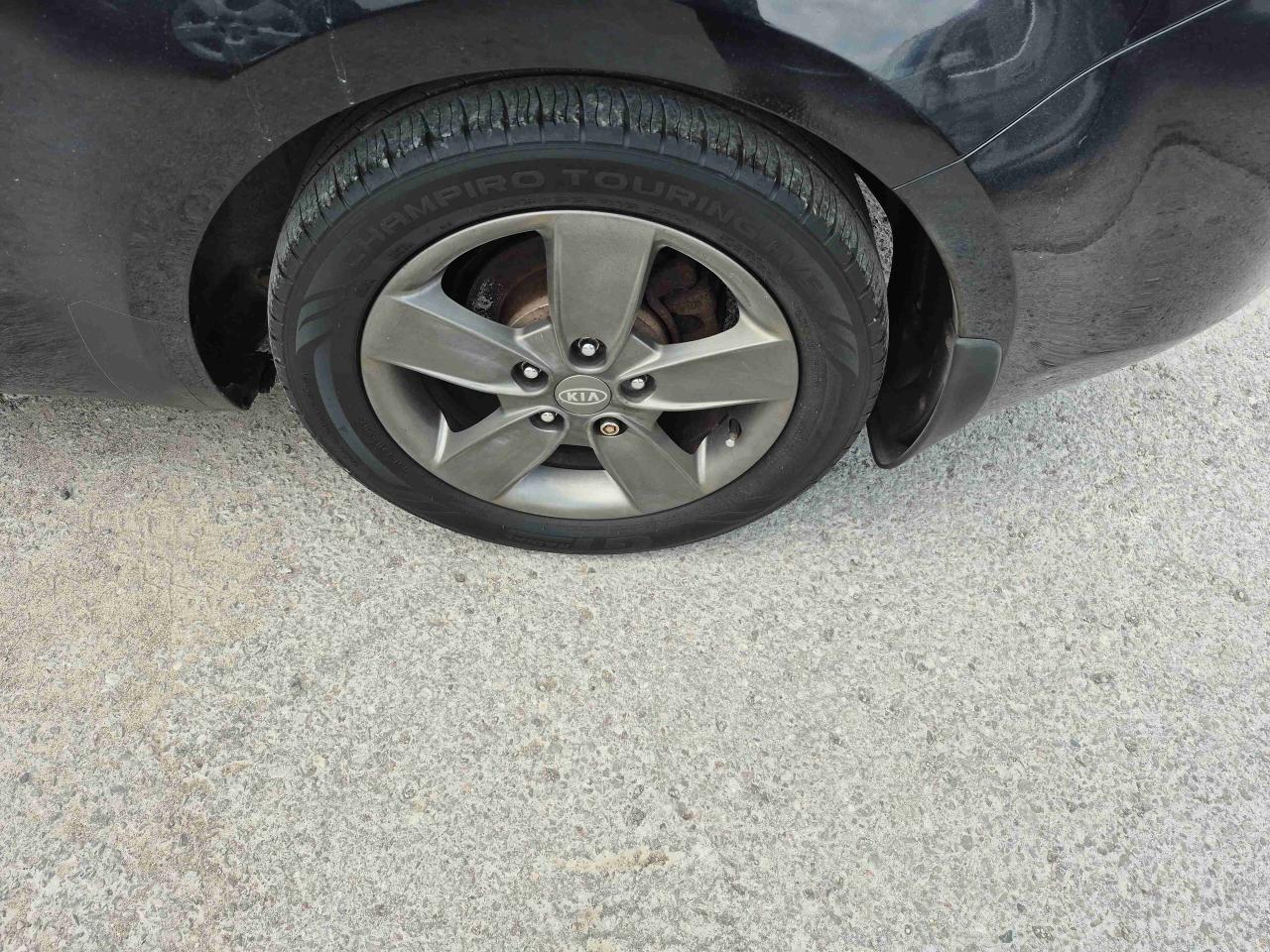 12863705