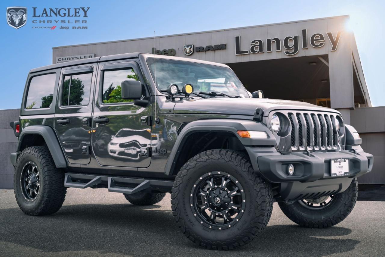 <p><strong>2023 Jeep Wrangler</strong></p>

<p>An iconic and highly capable SUV.</p>

<ul>
 <li>
 <p>3.6L Pentastar V6 engine (285 hp, 260 lb-ft torque).  </p>
 </li>
 <li>
 <p>Legendary 4x4 capability.  </p>
 </li>
 <li>
 <p>Available 6-speed manual or 8-speed automatic transmission.  </p>
 </li>
 <li>
 <p>Removable top and doors for an open-air experience.</p>
 </li>
</ul>

<p>Come book a test drive at Langley Chrysler, conveniently located in Langley, British Columbia.</p>

<p><strong>Scroll down to see the full list of options and features.</strong></p>
Dealer number: 5097, Doc fee: $968 Safety & Convince Warranty: $699 Finance Placement: $628

<p>*All prices plus applicable taxes, applicable environmental recovery charges, documentation of $599 and full tank of fuel surcharge of $76 if a full tank is chosen. <br />Other protection items available that are not included in the above price:<br />Tire & Rim Protection and Key fob insurance starting from $599<br />Service contracts (extended warranties) for coverage up to 7 years and 200,000 kms starting from $599<br />Custom vehicle accessory packages, mudflaps and deflectors, tire and rim packages, lift kits, exhaust kits and tonneau covers, canopies and much more that can be added to your payment at time of purchase<br />Undercoating, rust modules, and full protection packages starting from $199<br />Financing Fee of $500 when applicable<br />Flexible life, disability and critical illness insurances to protect portions of or the entire length of vehicle loan</p>