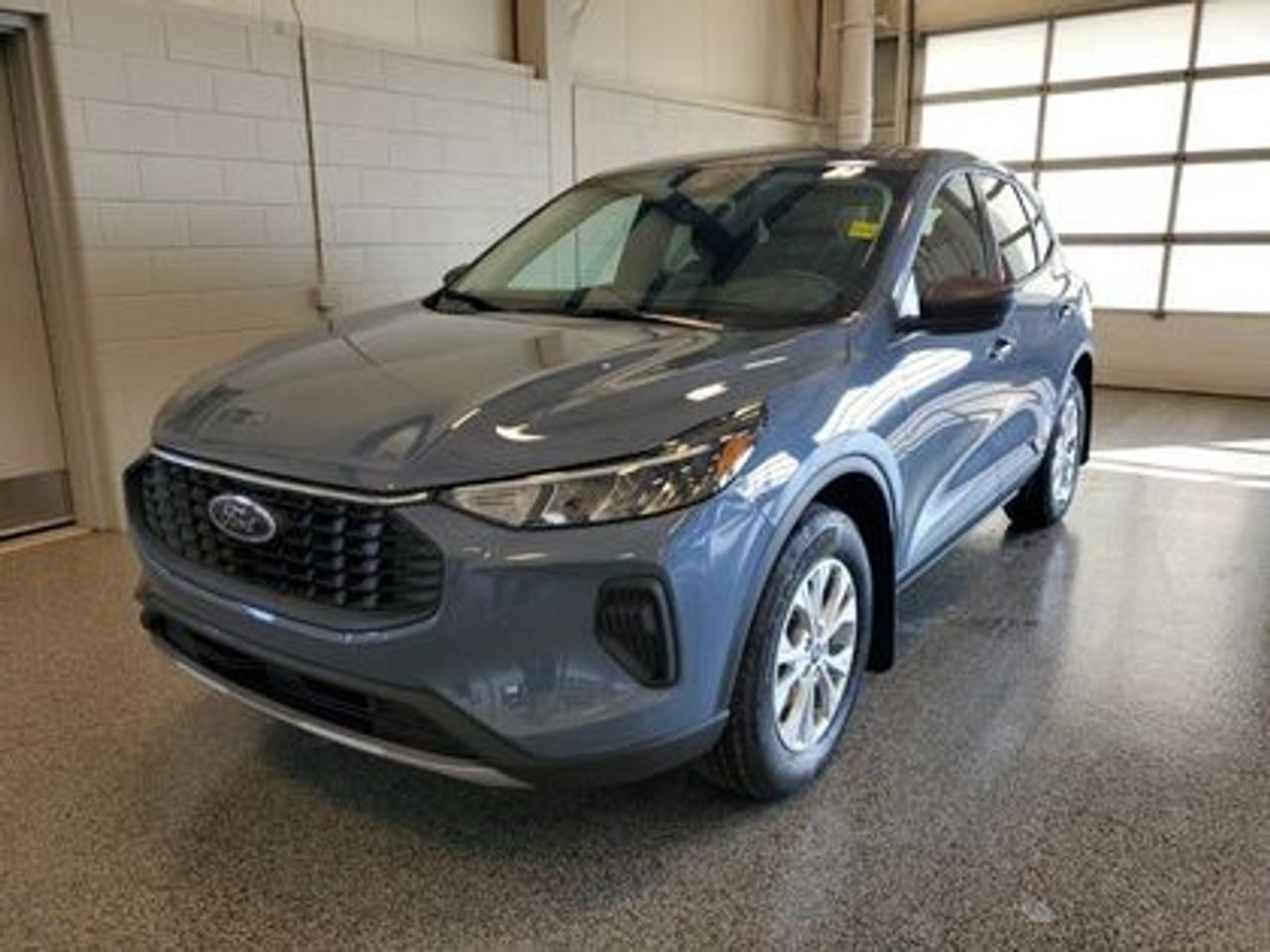 This all-new 2025 Escape Active 200A looks absolutely stunning in Vapor Blue Metallic. This 5-passenger All-wheel drive crossover comes equipped with the 1.5L EcoBoost® engine. This remarkable engine not only produces 181 horsepower and 190 ft-lbs of torque, but by leveraging EcoBoost® technology and an 8-speed automatic transmission, this crossover is rated to get an estimated 8.4L/100km (34 miles per gallon) combined highway/city fuel economy.

Key Features:
8 Instrument panel cluster
 All-wheel drive
Ford Co-Pilot360
Heated Front Seats
Remote Start
Heated Mirrors
SYNC® 4 W/8 LCD Capacitive Touchscreen
Wireless Apple CarPlay® and Android Auto Compatibility
Privacy Glass
17 Shadow Silver Painted Aluminum Wheels
Power Windows
LED Taillamps
LED Headlamps
FordPass Connect

Moose Jaw Ford, conveniently located at 1010 North Service Road in Moose Jaw, is your trusted destination for all your automotive needs. With an impressive 4.8-star Google rating from nearly 1,500 reviews, we are proud to deliver an exceptional vehicle-buying experience tailored just for you. Our Moose Jaw Motives set us apart, offering unbeatable value like half-priced oil changes for life on pre-owned vehicles, one year of key and remote protection, and one year of tire and rim protection. Enjoy peace of mind with every purchase. At Moose Jaw Ford, were committed to driving positive change in our community by combining exceptional service, high-quality vehicles, and a guest-first approach. Visit us today!