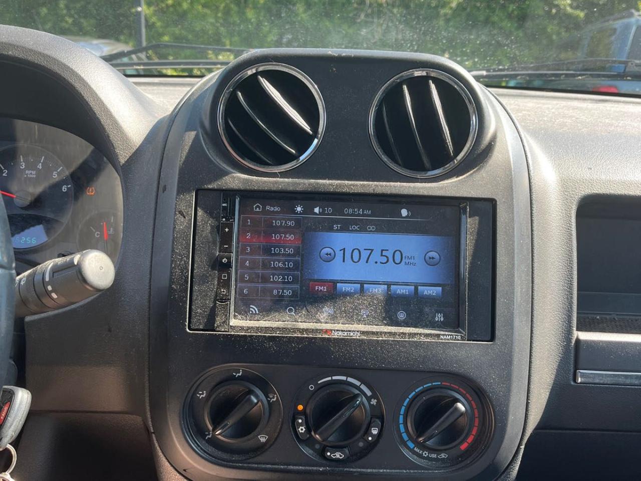 12867977