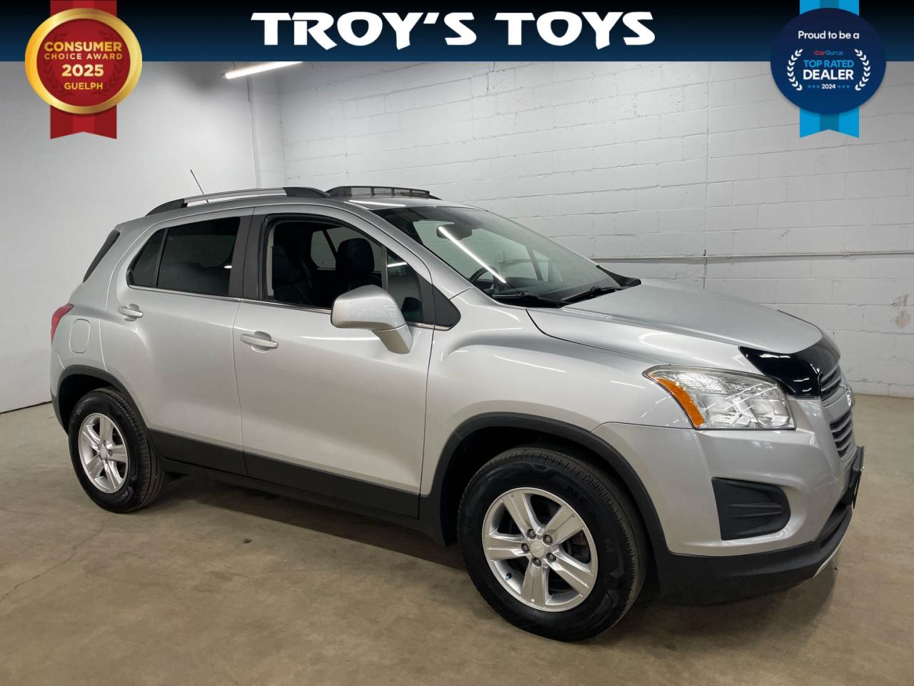 <p>Looking for a stylish and practical compact SUV thats ready for any adventure? Then check out this sleek, silver 2016 Chevrolet Trax AWD 4dr LT, available now at Troys Toys! This versatile crossover boasts a fuel-efficient 1.4L I4 engine, perfect for navigating city streets or hitting the open road. With its comfortable black interior and all-wheel-drive capability, this Trax is ready to handle whatever the Canadian weather throws your way. Its the perfect blend of practicality and style, making it an ideal choice for anyone seeking a reliable and enjoyable driving experience. This Trax has 153,832km on the odometer.</p><p>This 2016 Chevrolet Trax LT is packed with features designed to enhance your driving experience. Youll love the convenience of its automatic transmission and four doors, making it easy to load up passengers and gear. The all-wheel drive system provides added confidence and control in various driving conditions. Plus, with its compact size, this Trax is a breeze to maneuver and park, making it ideal for urban environments.</p><p>Here are a few of the features that will get you excited:</p><ul><li><strong>All-Wheel Drive:</strong> Conquer any road condition with confidence and control.</li><li><strong>Fuel-Efficient Engine:</strong> Save money at the pump while enjoying a smooth and responsive ride.</li><li><strong>Stylish Design:</strong> Make a statement with its sleek silver exterior and modern design.</li><li><strong>Automatic Transmission:</strong> Enjoy effortless driving with the convenience of an automatic transmission.</li><li><strong>Compact and Agile:</strong> Navigate city streets with ease and park in tight spaces.</li></ul><p><strong><em>Powered by AutoIntelligence™</em></strong> Vehicle information has been generated using artificial intelligence and is provided for informational purposes only. While efforts are made to ensure accuracy, please confirm all details directly with the dealer.</p>