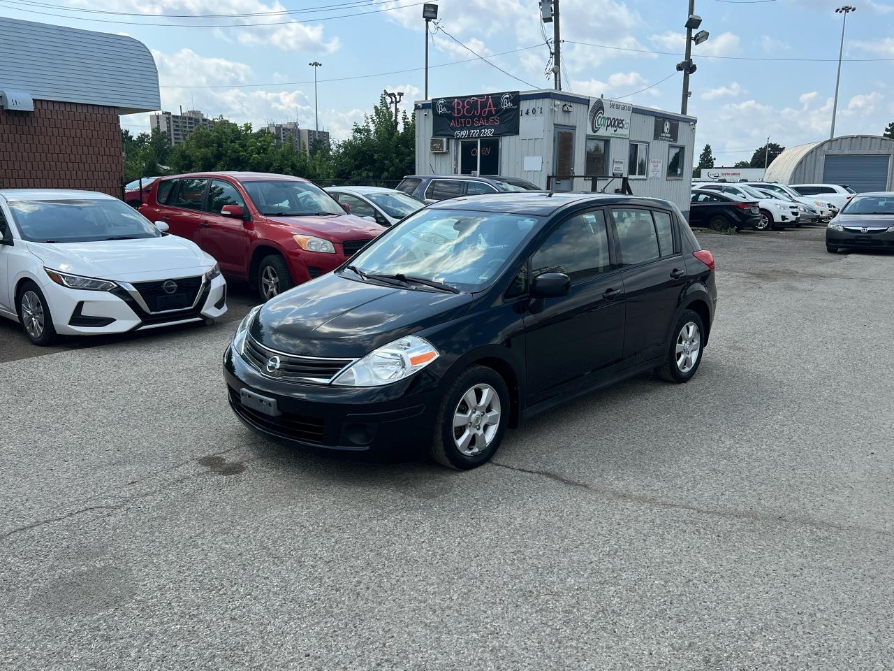 2011 Nissan Versa 5dr HB I4 CVT 1.8 SL - Photo #3