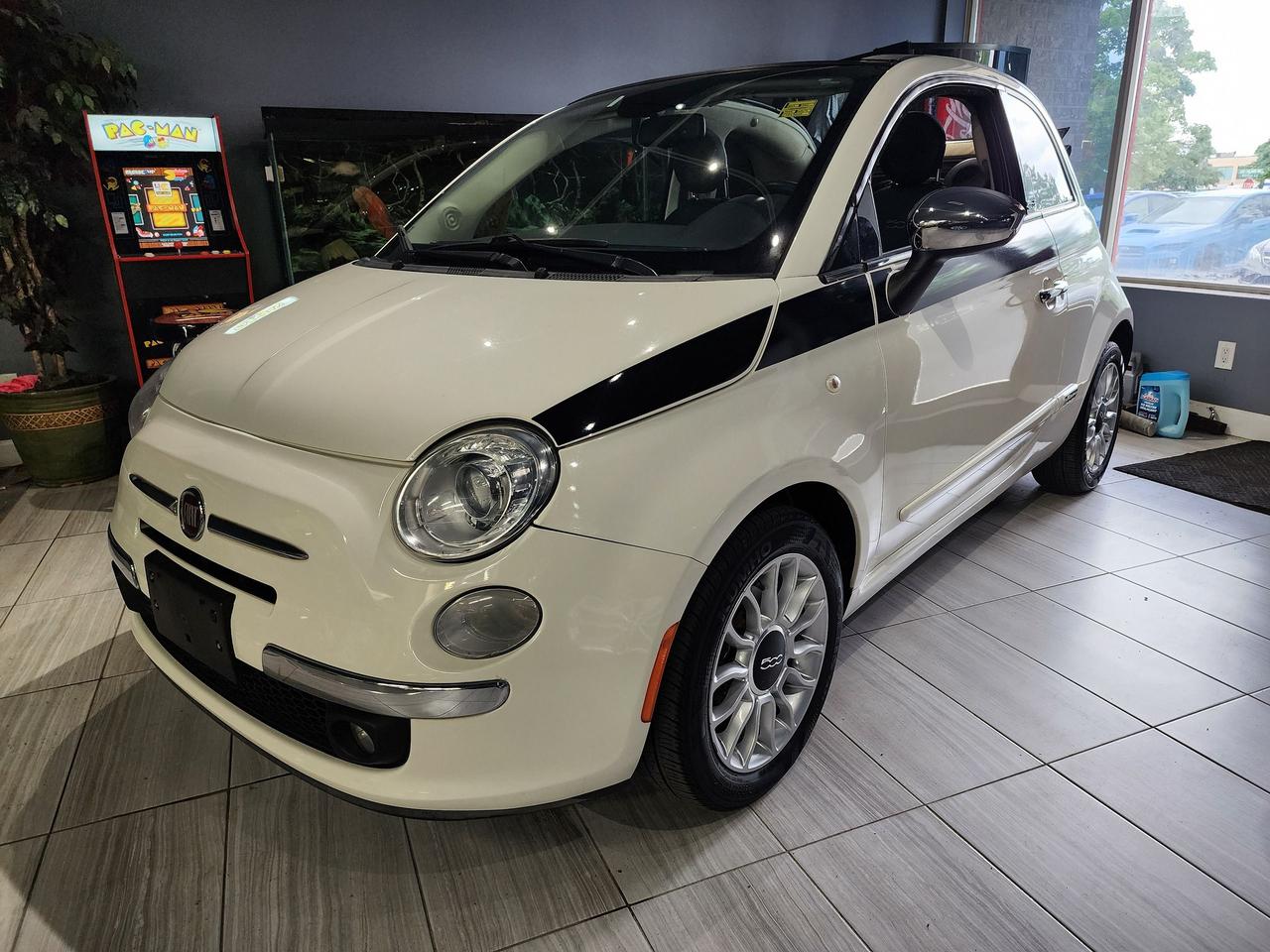 <p>Wow!!!! Convertible Lounge edition!!!! Automatic!!! You wont find one cleaner,black leather,loaded with options like heated seats, auto climate control, steering wheel controls,HID XENON headlamps and so much more,we just put this Fiat through the certification inspection and it received a complete front and rear brakes service which included brand new front and rear brake rotors and pads and new front wheel bearings,drives like new,very well kept....Absolutely no disappointments here,sold certified, sale price does not include licensing or taxes.... Providing the public with quality pre-owned vehicles since 1995!!!! Warranties and financing are available O.A.C&nbsp;</p>