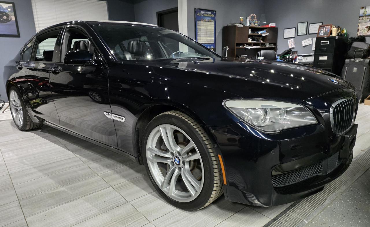 <p>WOW!!!! 750Li X-Drive with only 77,000 original kms,every option that was possible including M-Sport Aero dynamics package,night vision!!!! Blind spot,radar cruise control,crash avoidance,lane departure warning,side view cameras,Bluetooth audio,side and rear sun shades,rear heated seats,A.C seats and so much more,all original body and paint,clean Carfax history NO ACCIDENTS, Ontario vehicle since new,absolutely no disappointments here, the nicest 2012 Li Xdrive around!!!!! ,sold certified, sale price does not include licensing or taxes..... Providing the public with quality pre-owned vehicles since 1995!!!! Warranties and financing are available O.A.C&nbsp;</p>