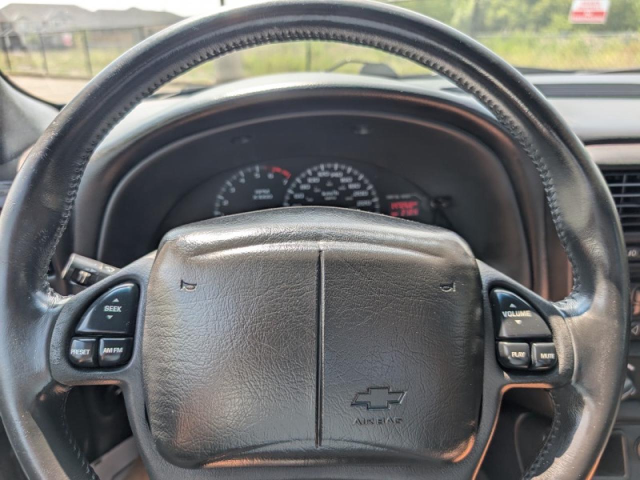 12870557