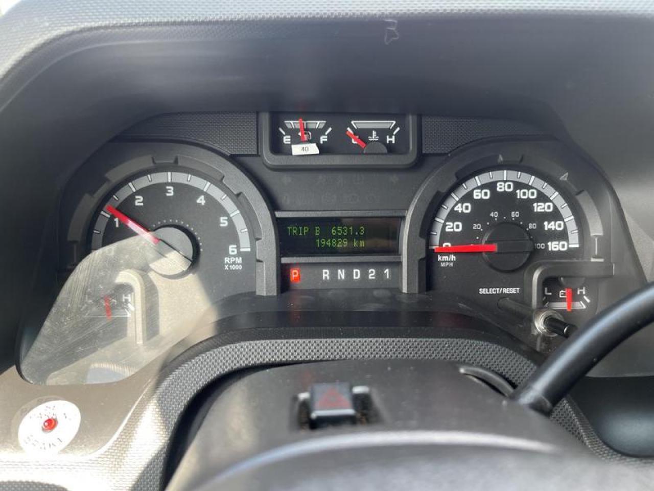 12873785