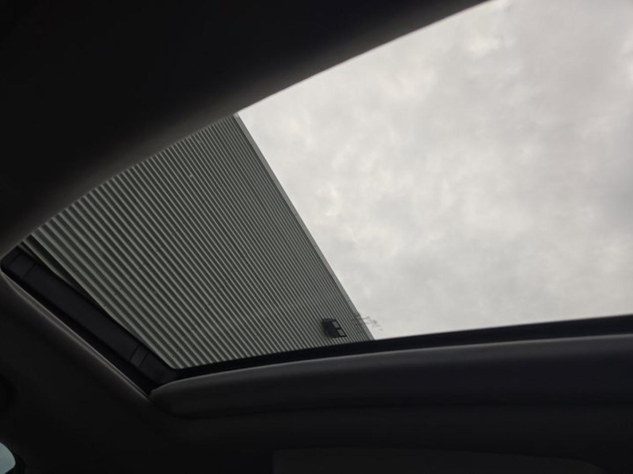 12874037