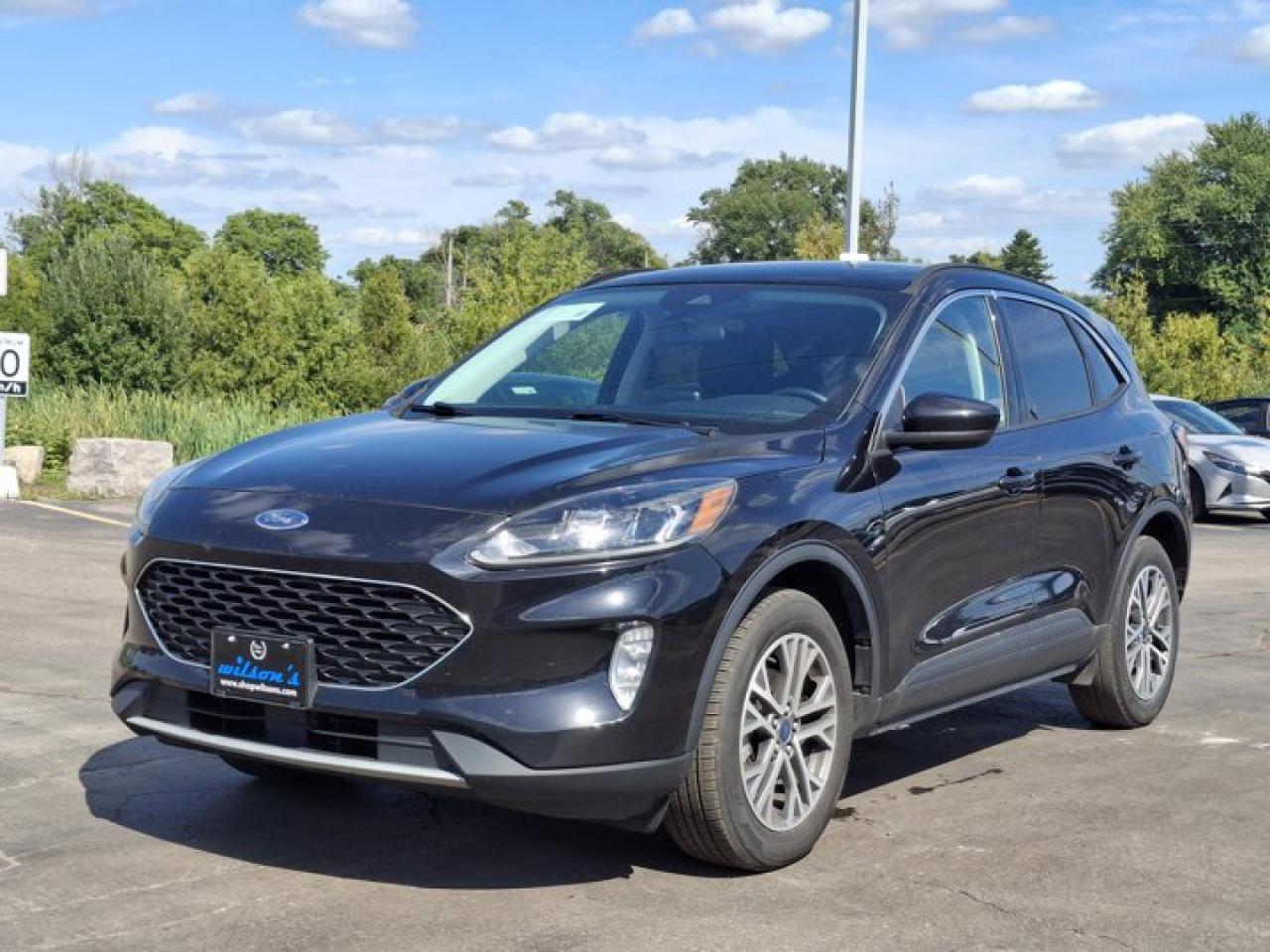 Come see this certified 2022 Ford Escape SEL AWD | Pano Sunroof | Leather | Adaptive Cruise | Nav | Heated Wheel + Seats | and More !. Its Automatic transmission and 1.5 L engine will keep you going. This Ford Escape comes equipped with these options: Panoramic Roof, Navigation System, Leather, Heated Steering Wheel, Air Conditioning, Adaptive Cruise Control, Heated Seats, Tilt Steering Wheel, Steering Radio Controls, and Power Windows. See it for yourself at Mark Wilsons Better Used Cars, 5055 Whitelaw Road, Guelph, ON N1H 6J4.60+ years of World Class Service!500+ Live Market Priced VEHICLES! ONE MASSIVE LOCATION!Free Local Delivery Available!FINANCING! - Better than bank rates! 6 Months No Payments available on approved credit OAC. Zero Down Available. We have expert licensed credit specialists to secure the best possible rate for you and keep you on budget ! We are your financing broker, let us do all the leg work on your behalf! Click the RED Apply for Financing button to the right to get started or drop in today!BAD CREDIT APPROVED HERE! - You dont need perfect credit to get a vehicle loan at Mark Wilsons Better Used Cars! We have a dedicated licensed team of credit rebuilding experts on hand to help you get the car of your dreams!WE LOVE TRADE-INS! - Top dollar trade-in values!SELL us your car even if you dont buy ours! HISTORY: Free Carfax report included.Certification included! No shady fees for safety!EXTENDED WARRANTY: Available30 DAY WARRANTY INCLUDED: 30 Days, or 3,000 km (mechanical items only). No Claim Limit (abuse not covered)5 Day Exchange Privilege! *(Some conditions apply)CASH PRICES SHOWN: Excluding HST and Licensing Fees.2021-2026 vehicles may be daily rentals. Please inquire with your salesperson.We have made every reasonable attempt to ensure options are correct but please verify with your sales professional