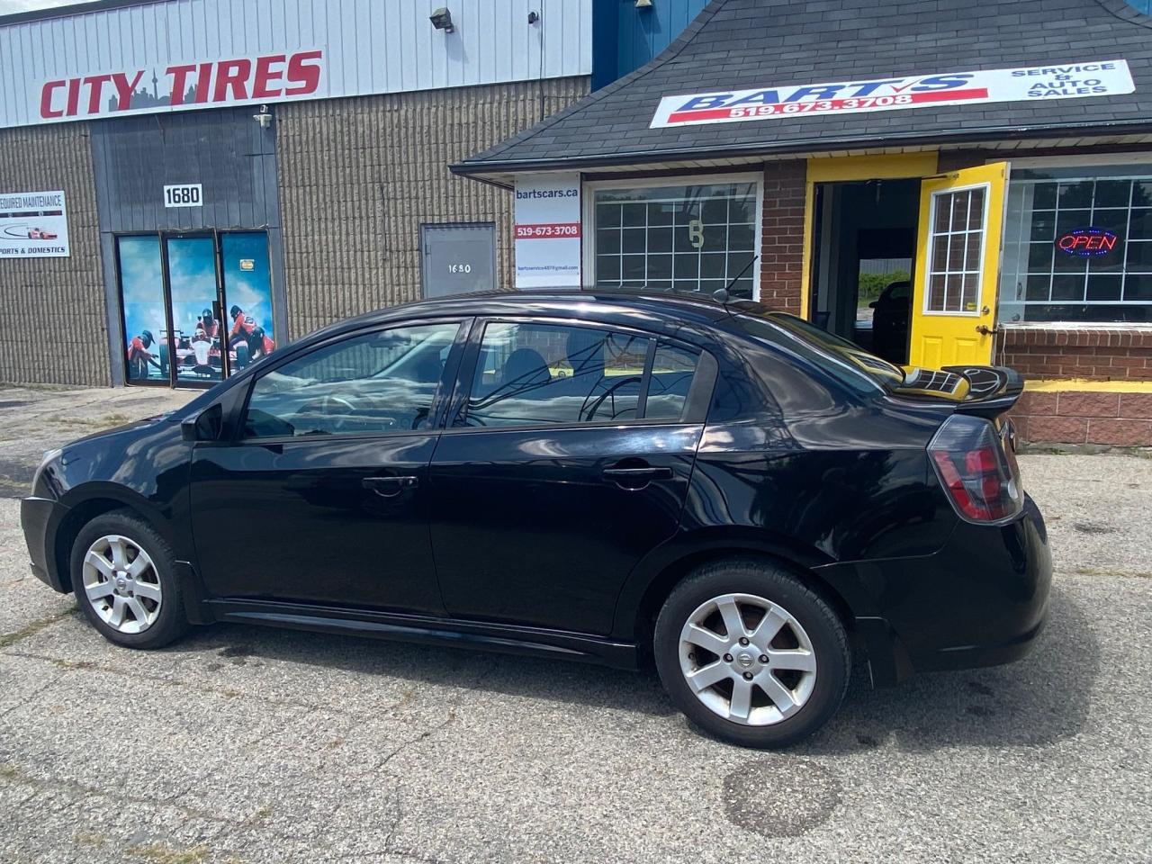 2012 Nissan Sentra 4dr Sdn I4 CVT 2.0 S - Photo #2