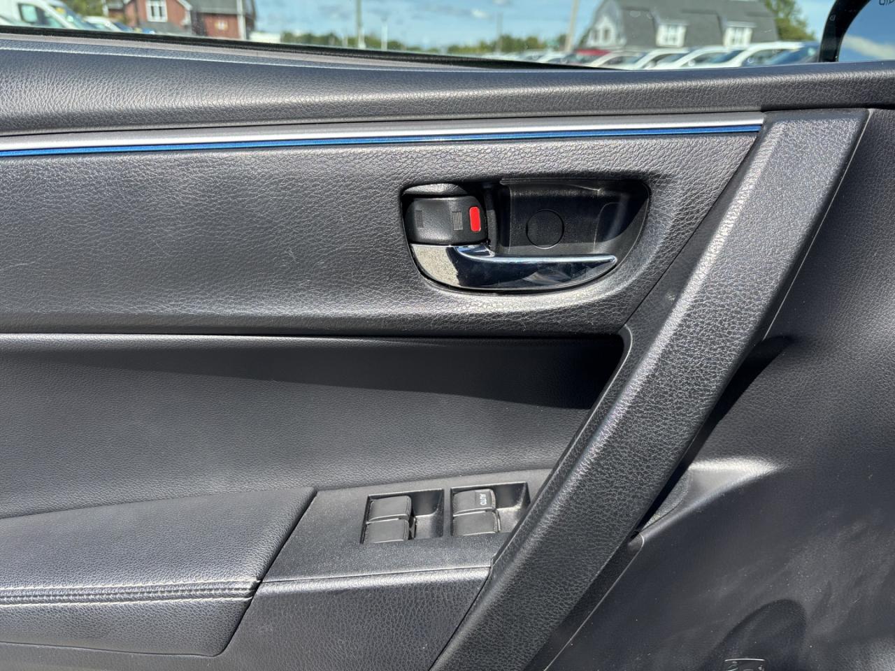 12875765