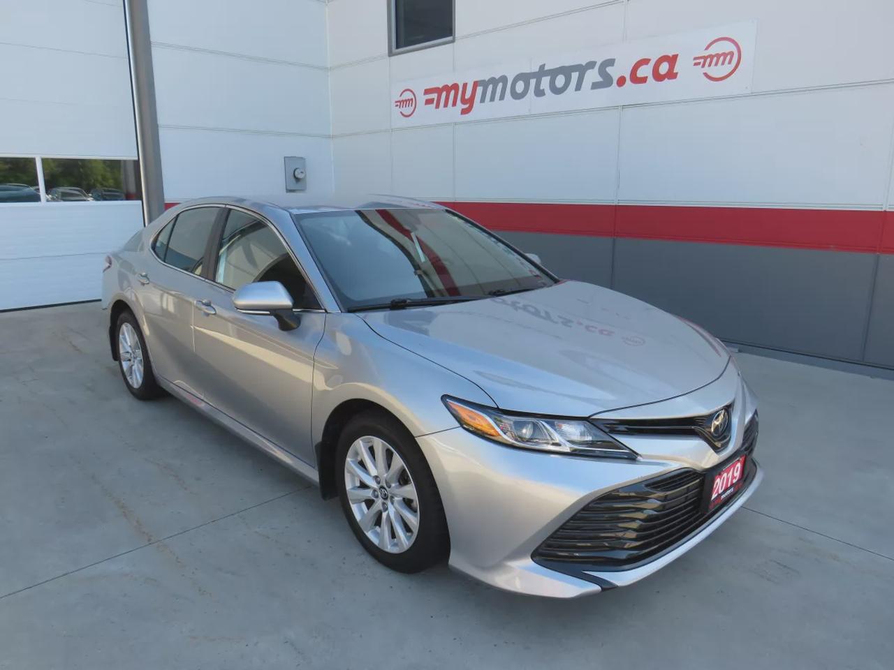 2019 Toyota Camry LE | Clean Title | No Accidents | Safety Certified | Power Seats | Lane Assist | Digital Touchscreen | Heated Seats | Reverse Camera | Traction Control | Bluetooth | Cruise Control Photo0