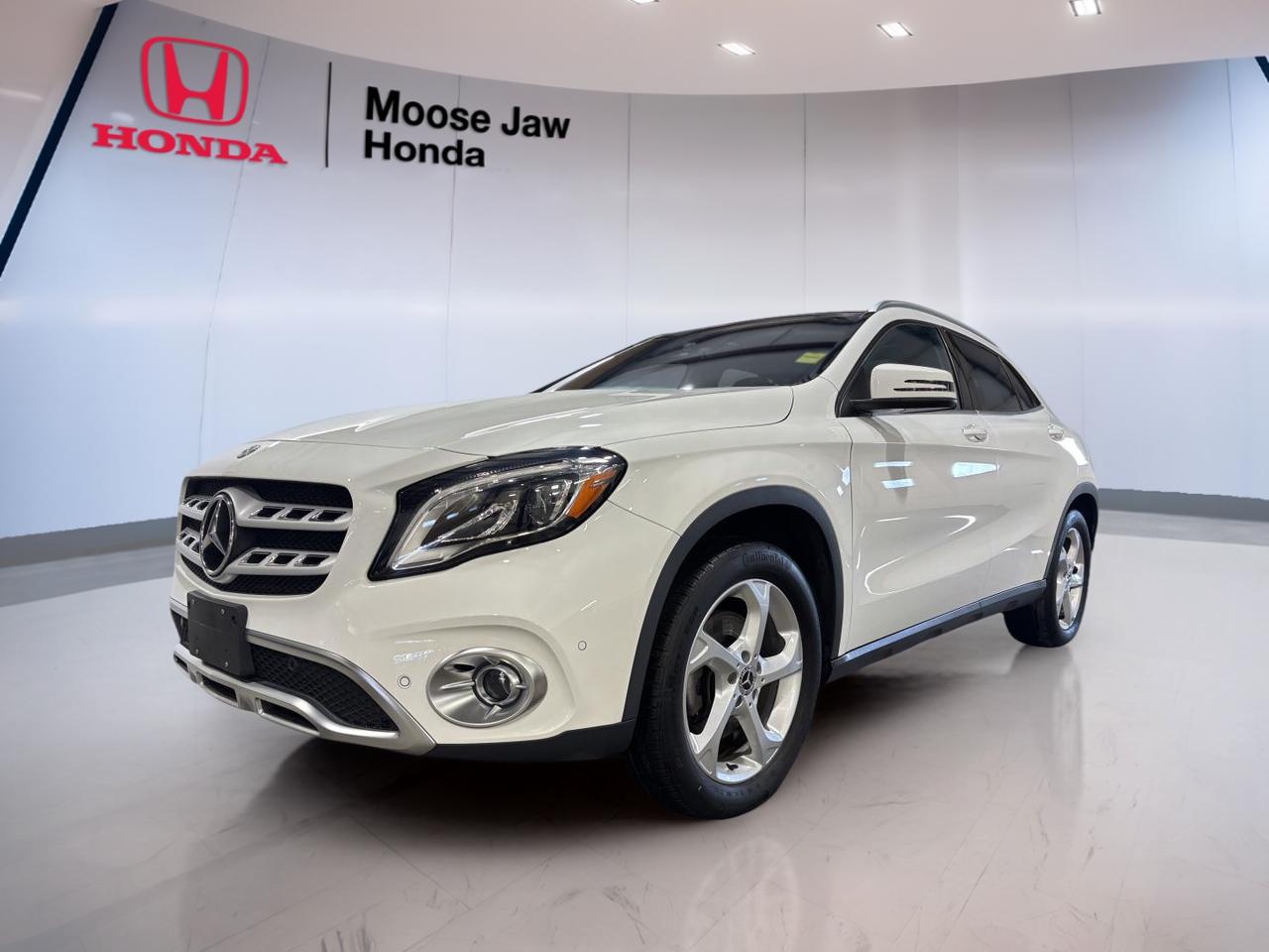 Experience luxury and performance with the 2019 Mercedes-Benz GLA-Class GLA 250, now available at Moose Jaw Honda. This compact luxury SUV stands out with its striking Navy & Grey exterior and matching interior, offering a sophisticated look inside and out. With only 61,346 km on the odometer, it?s a well-maintained choice for drivers seeking style, comfort, and reliability. The 2.0L I-4 DOHC Turbo engine with direct injection delivers a dynamic driving experience, while the advanced 7-Speed DCT Dual-Clutch Automatic transmission and all-wheel drive (traction intégrale) ensure confident handling in all conditions.

ADVANCED SAFETY FEATURES
»» Multiple airbags for comprehensive occupant protection
»» Stability control for enhanced driving confidence
»» Anti-lock braking system for controlled stops
»» Tire pressure monitoring system for added safety

PERFORMANCE AND EFFICIENCY
»» 2.0L turbocharged engine for responsive acceleration
»» 7-speed dual-clutch automatic for smooth shifting
»» All-wheel drive for superior traction in all seasons
»» Efficient fuel consumption for daily commuting

COMFORT AND CONVENIENCE
»» Dual-zone automatic climate control for personalized comfort
»» Power-adjustable front seats for easy customization
»» Split-folding rear seats for flexible passenger space
»» Keyless entry system for effortless access

TECHNOLOGY AND CONNECTIVITY
»» Central infotainment display for easy control
»» Bluetooth connectivity for hands-free communication
»» USB ports for device charging and media
»» Steering wheel-mounted controls for convenience

CARGO SPACE
»» Generous rear cargo area for daily needs
»» Flat-folding rear seats for expanded storage
»» Low cargo floor for easy loading and unloading
»» Multiple storage compartments throughout the cabin

WHAT OTHER OWNERS LIKE
»» Smooth and responsive turbocharged engine
»» Upscale, modern interior design
»» Confident all-wheel drive performance
»» User-friendly technology features

This 2019 Mercedes-Benz GLA-Class GLA 250s VIN is: WDCTG4GBXKJ593946.
