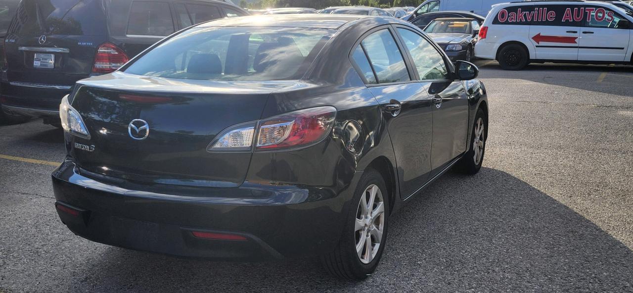 2011 Mazda MAZDA3 4dr Sdn Auto GX Photo
