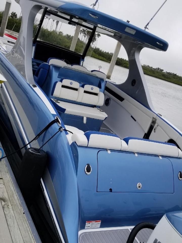 2018 Mystic Powerboats M4200 Center Console Boat t boasts 3 Mercury 350 horsepower Outboards, dual Garmin screens, Auto Pilot, Night Vision, Photo3